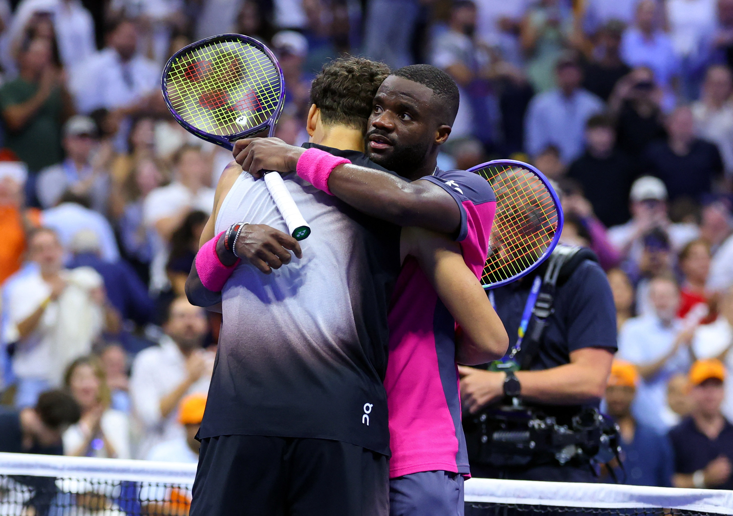 Tennis - U.S. Open - Flushing Meadows, New York, United States - September 11, 2026 Ben Shelton of the U.S. embraces Frances Tiafoe of the U.S. after winning his semi final match REUTERS/Mike Segar