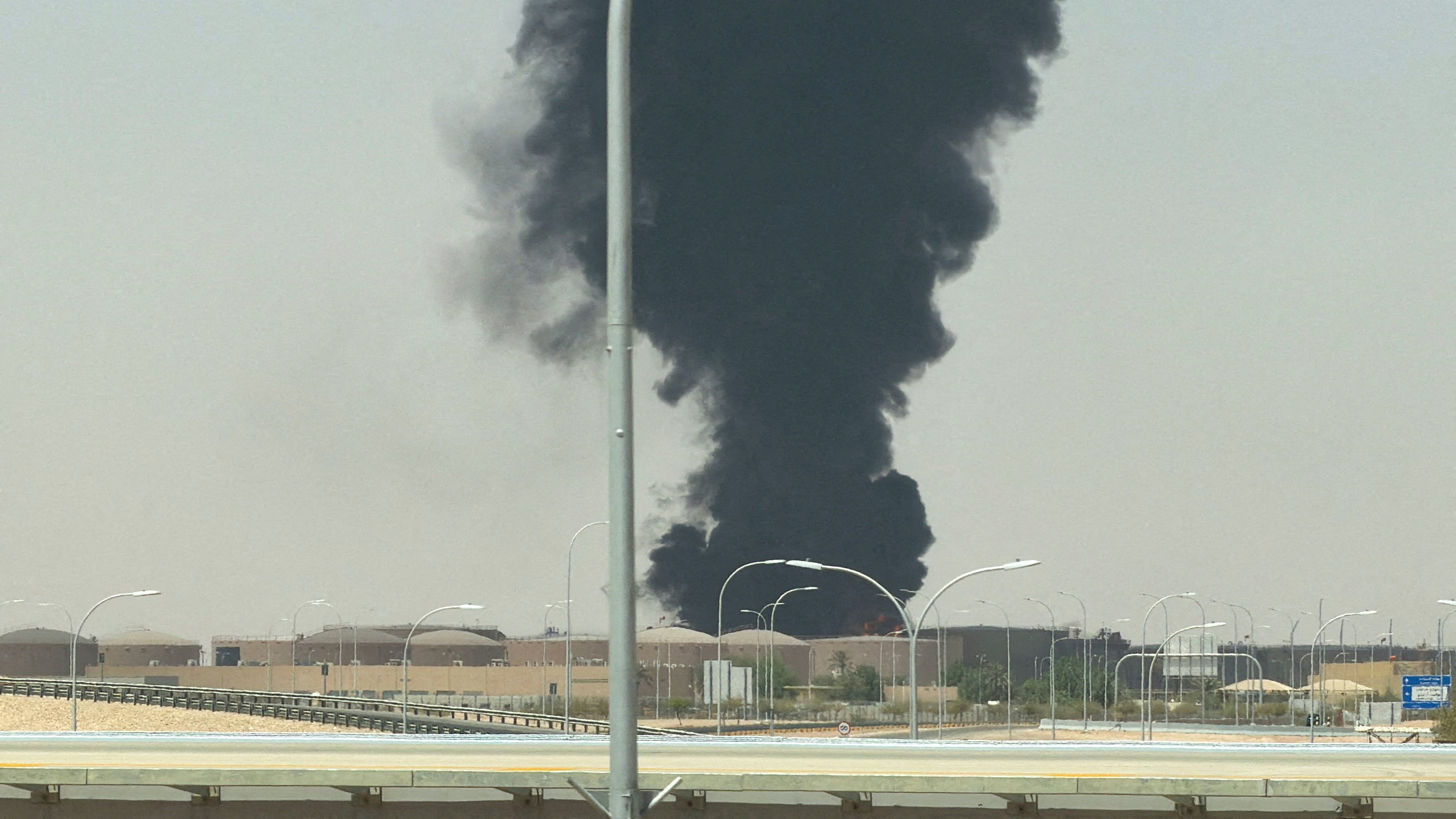 Large plume of black smoke rises from the fuel storage area at King Khalid International Airport, in Riyadh, Saudi Arabia on September 19, 2026 after Houthis claimed attack on the capital city