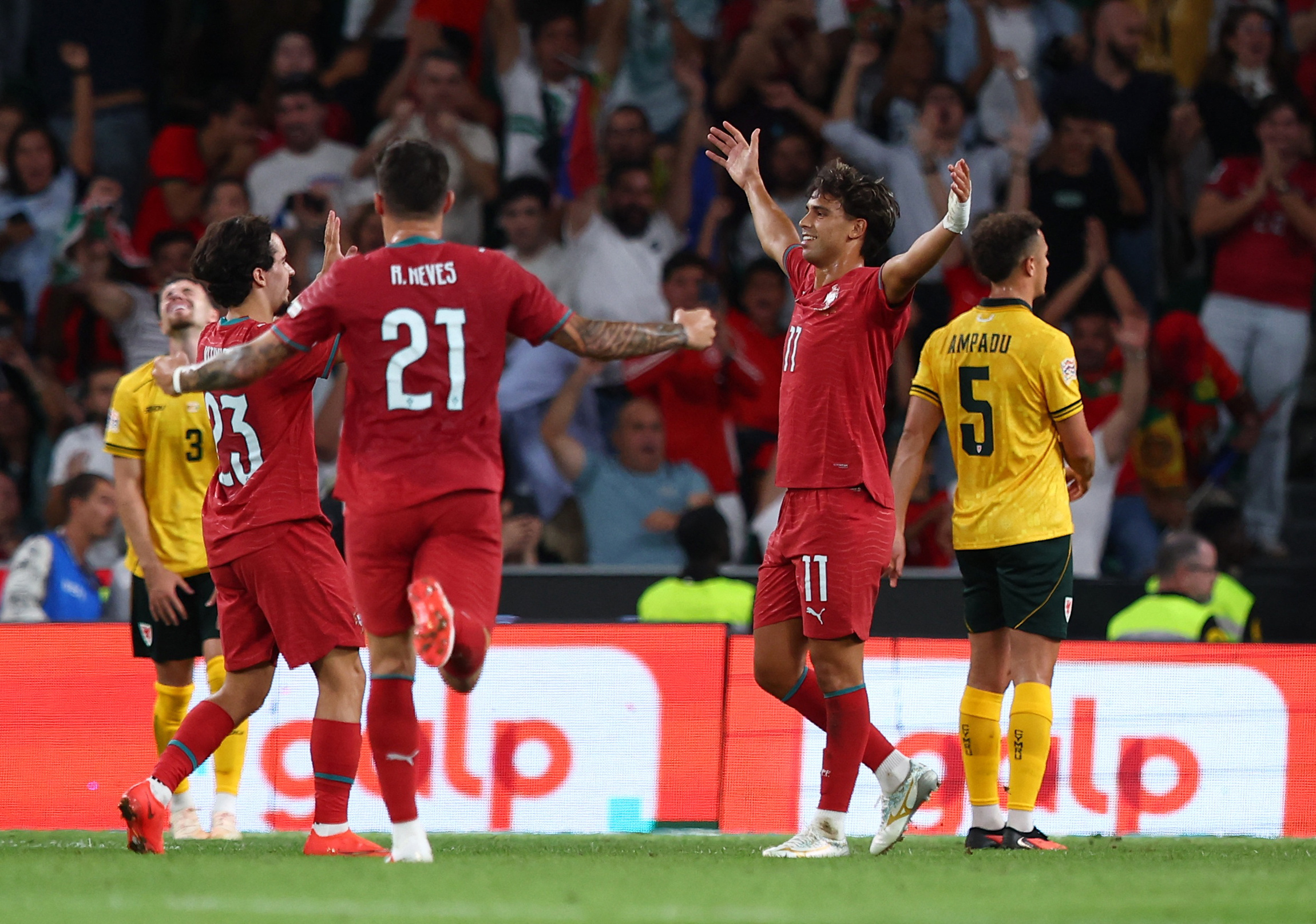 Soccer Football - Nations League - Group B - Portugal v Wales - Estadio Jose Alvalade, Lisbon, Portugal - September 24, 2026 Portugal's Joao Felix celebrates scoring their first goal with Vitinha and Ruben Neves REUTERS/Pedro Nunes