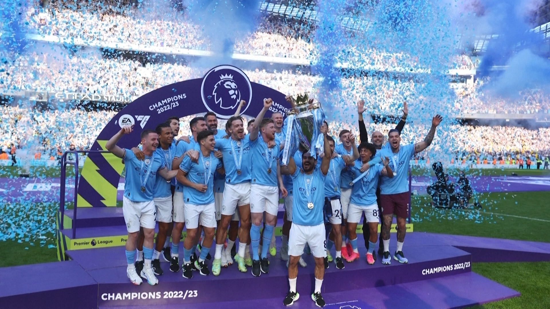 Manchester City players celebrate after winning the Premiere League title.