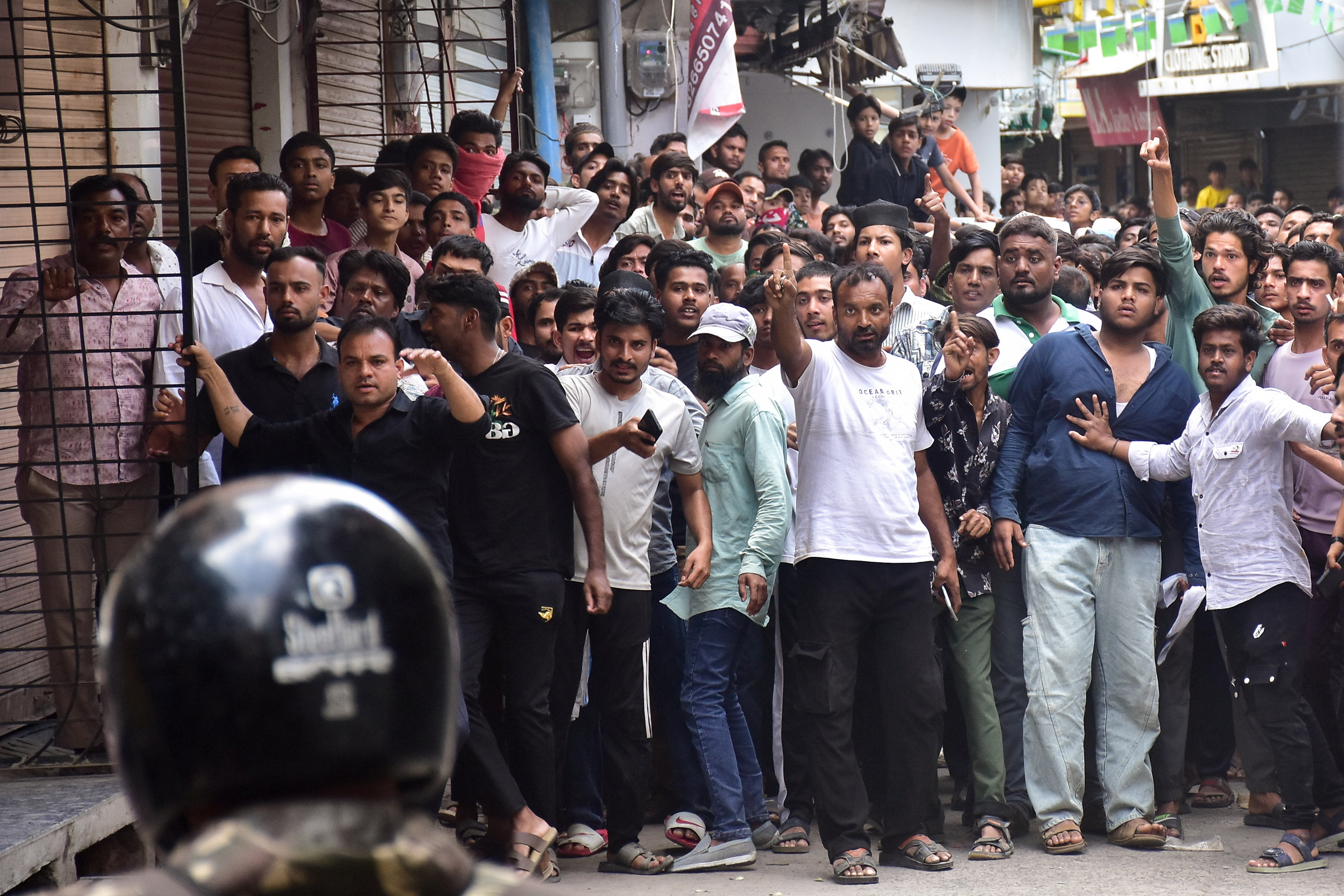 Protesters gesture towards police officers during a demonstration near the Shahi Masjid in Ujjain, Madhya Pradesh, India, September 28, 2026 [Reuters]