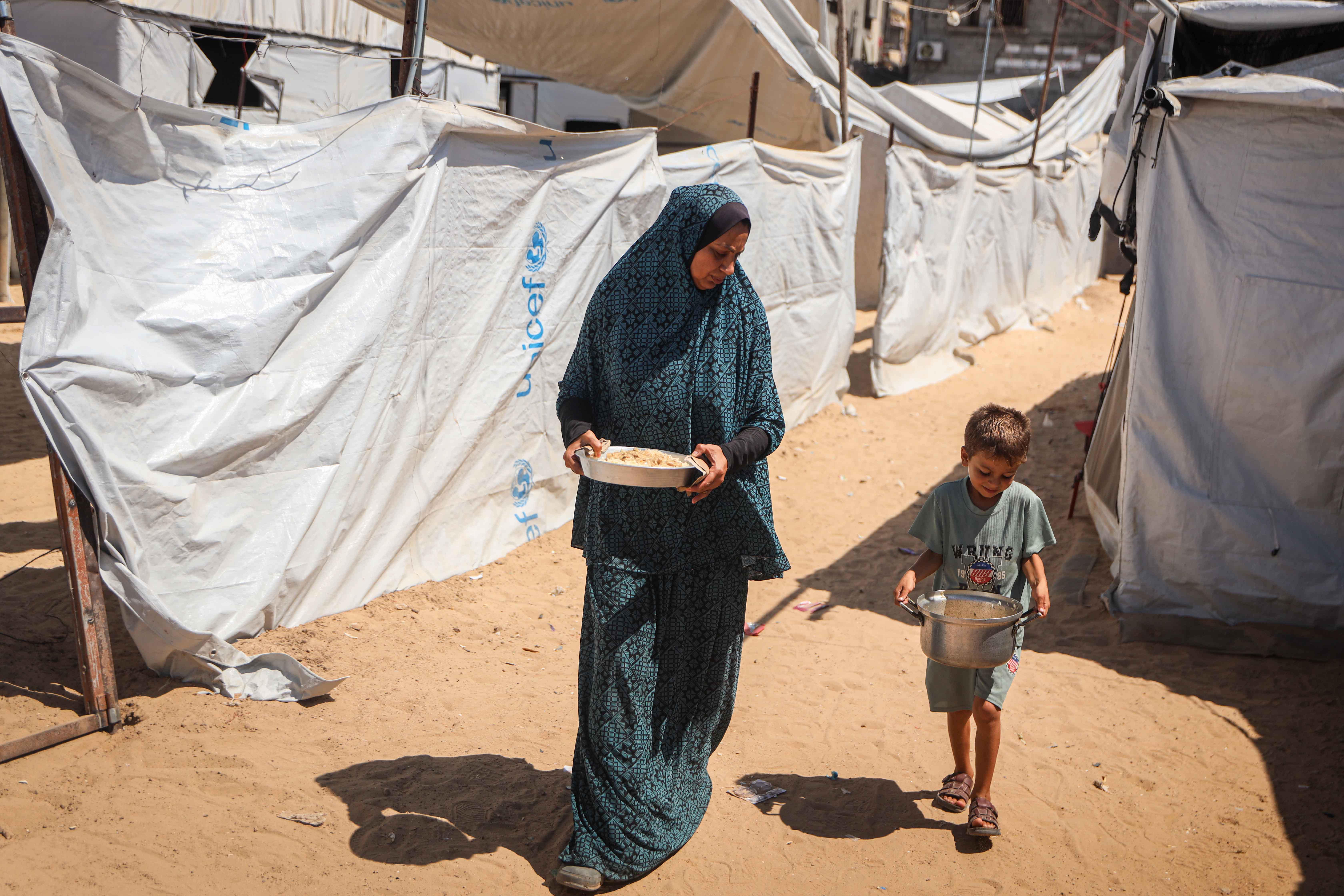 Community kitchens across Gaza have seen their operations fluctuate, leaving families with fewer and less reliable sources of cooked meals [Abdelhakim Abu Riash/Al Jazeera]