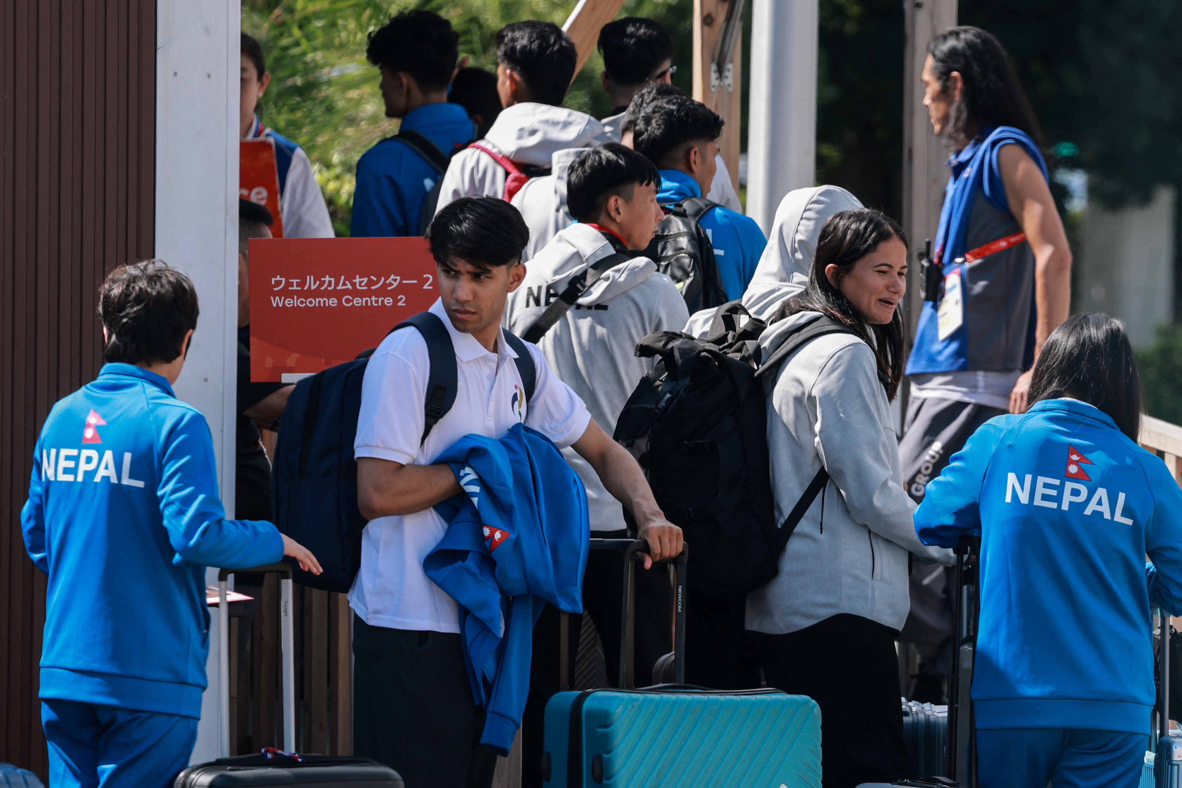 Members of Nepal's delegation arrive at the athletes' village ahead of the 2026 Asian Games in Nagoya, Aichi Prefecture on September 17, 2026. (Photo by DAVID GRAY / AFP)