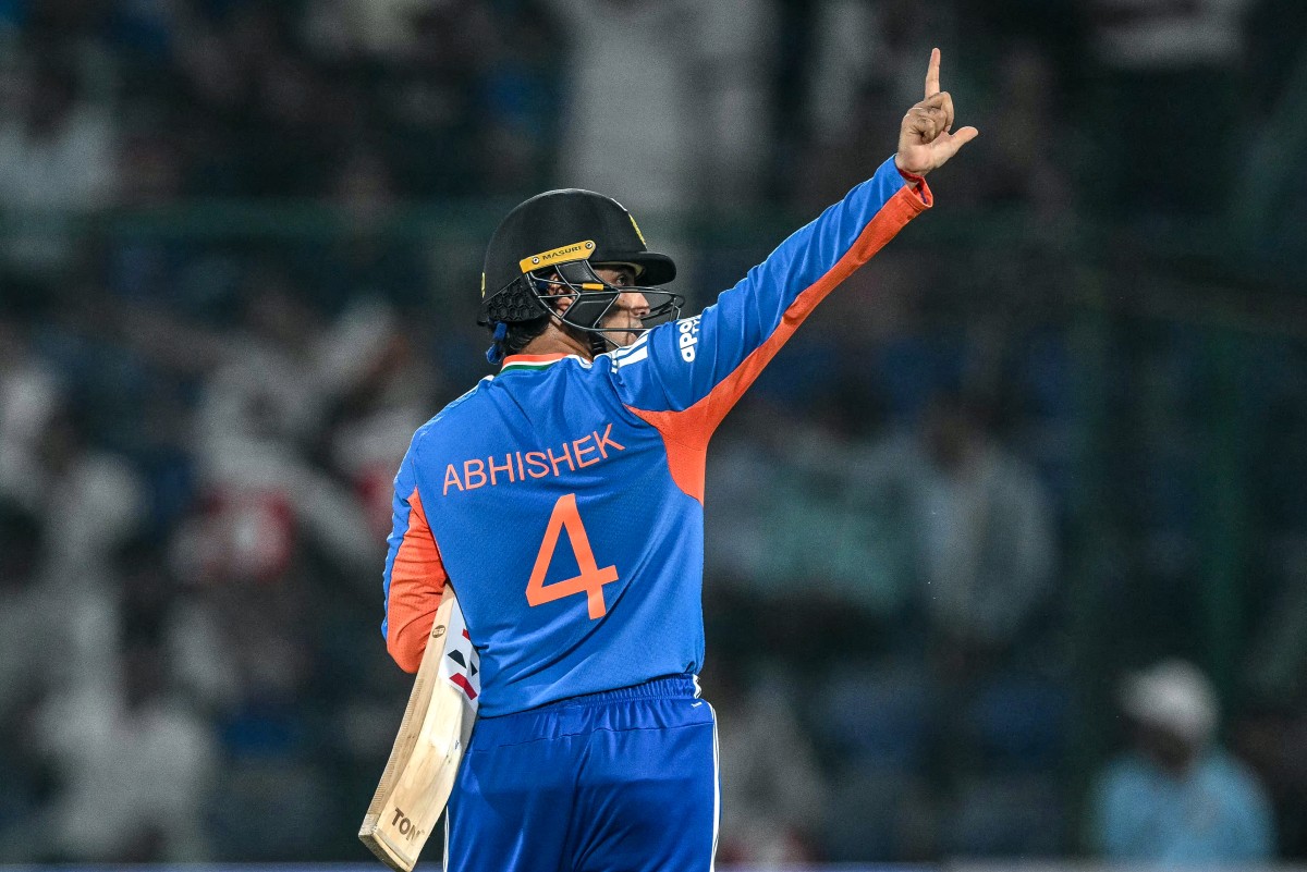 India's Abhishek Sharma celebrates after scoring a half-century (50 runs) during the third T20 international cricket match