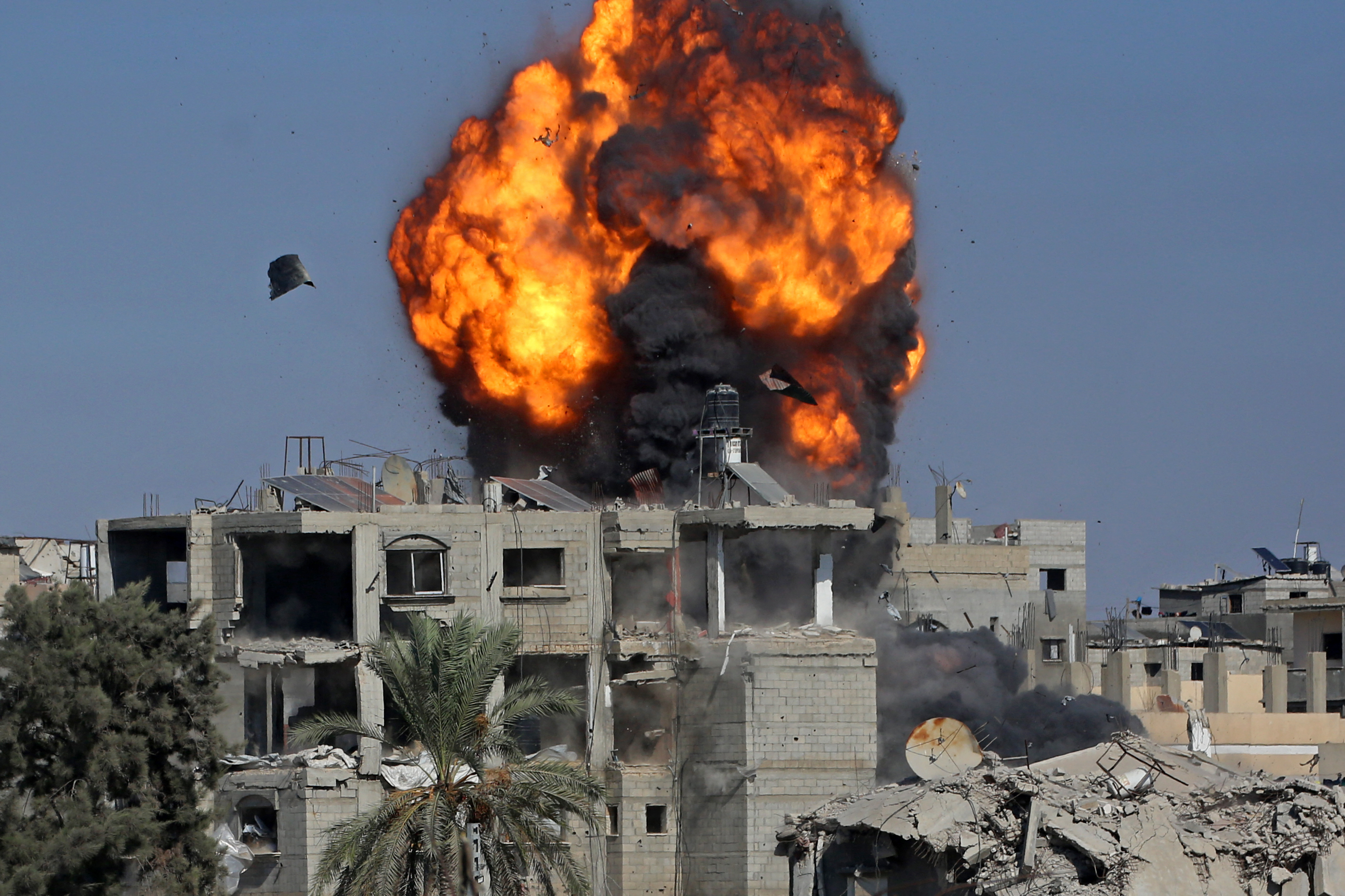TOPSHOT - Smoke and fire rises after a house was targeted by an Israeli strike in Khan Yunis, southern Gaza Strip on September 9, 2026.
