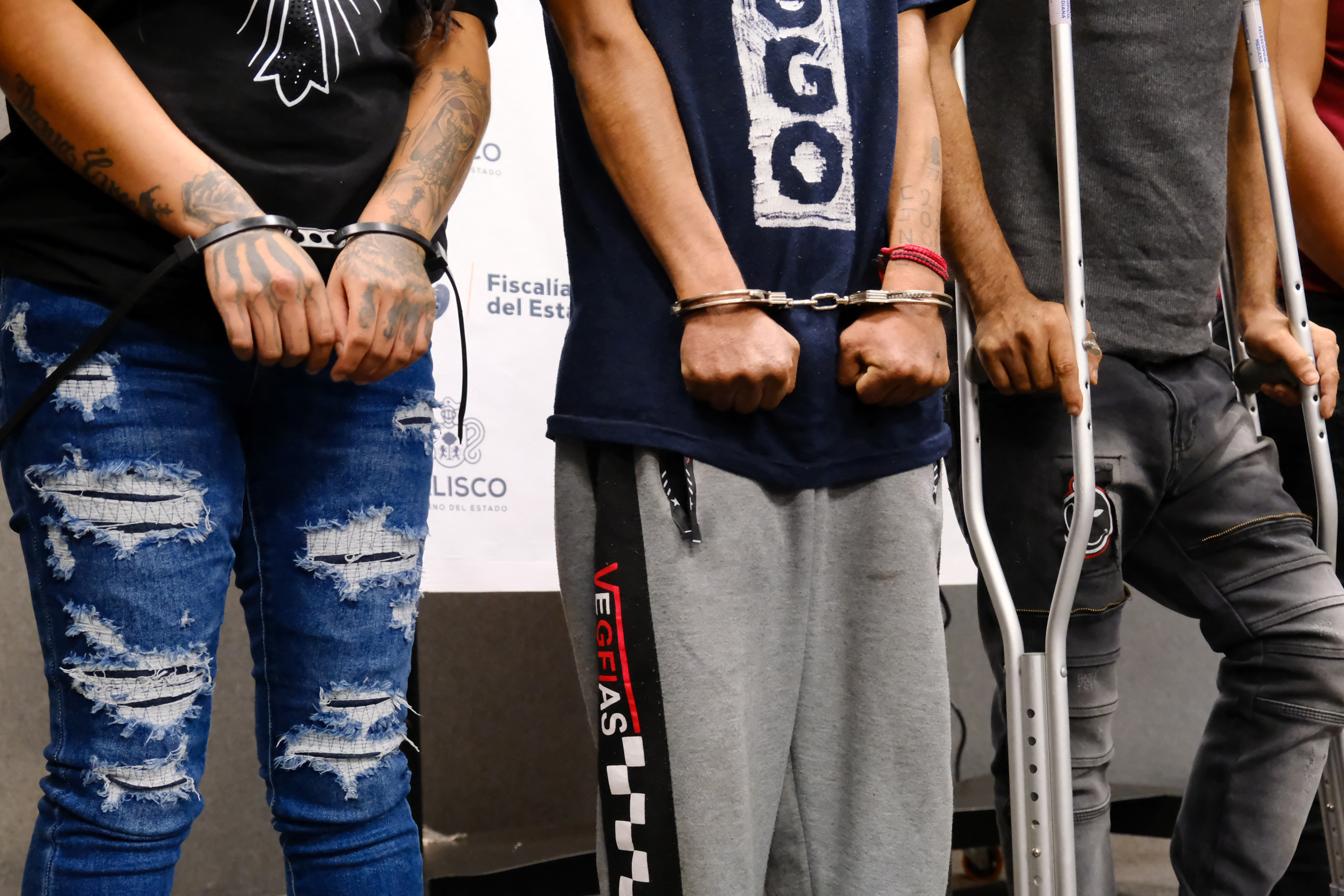 Handout picture released on September 10, 2026 by Mexico’s Public Prosecutor's Office showing suspects arrested during a raid at a clandestine clinic in Tecalitlan, state of Jalisco, on September 6, 2026.