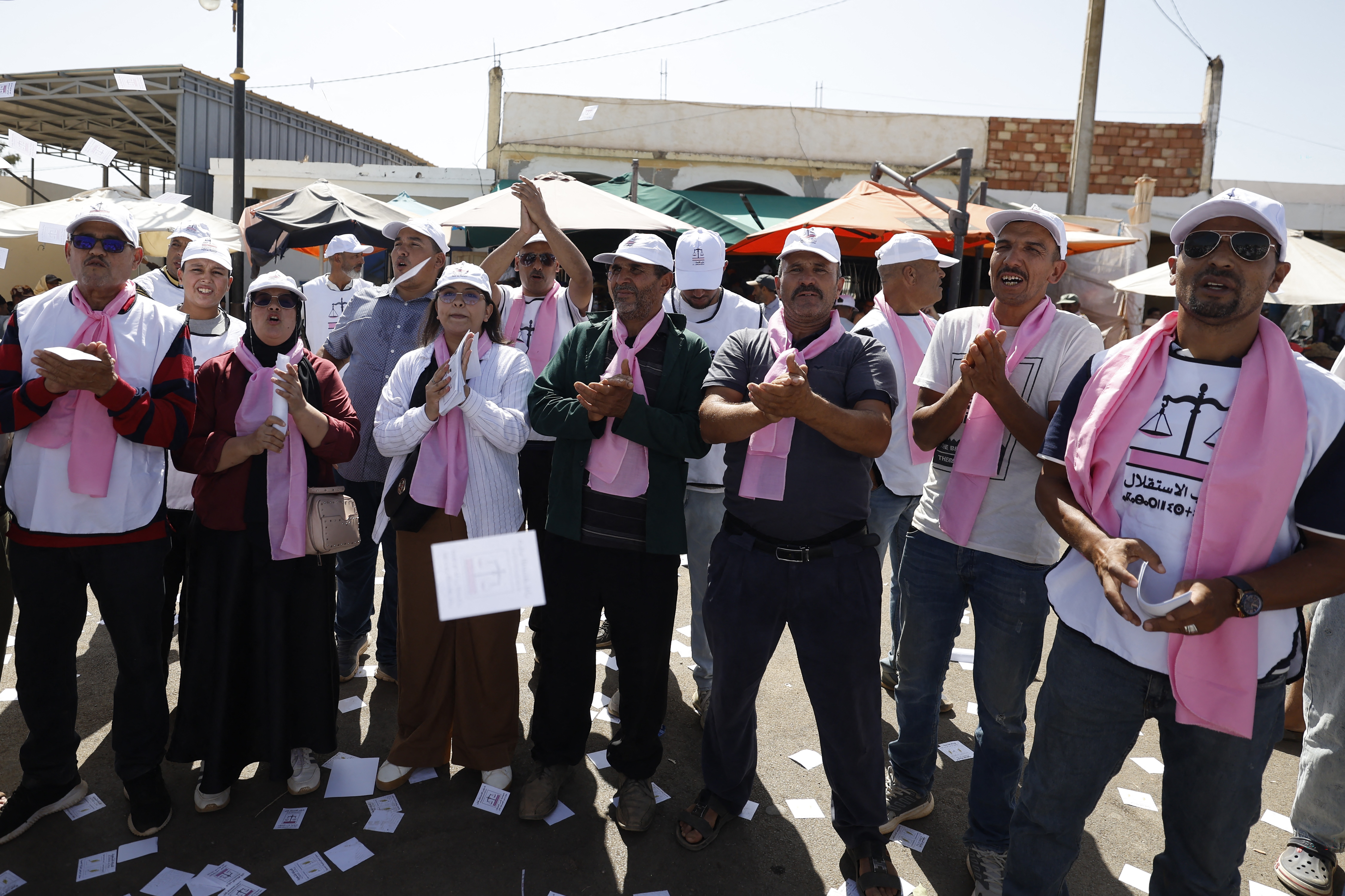 Campaigners and supporters of the Istiqlal Party (PI) chant slogans during a rally at the weekly souk in the rural commune of Ait Ikkou, in the Khemisset region, on September 19, 2026, before Morocco’s legislative elections [AFP]