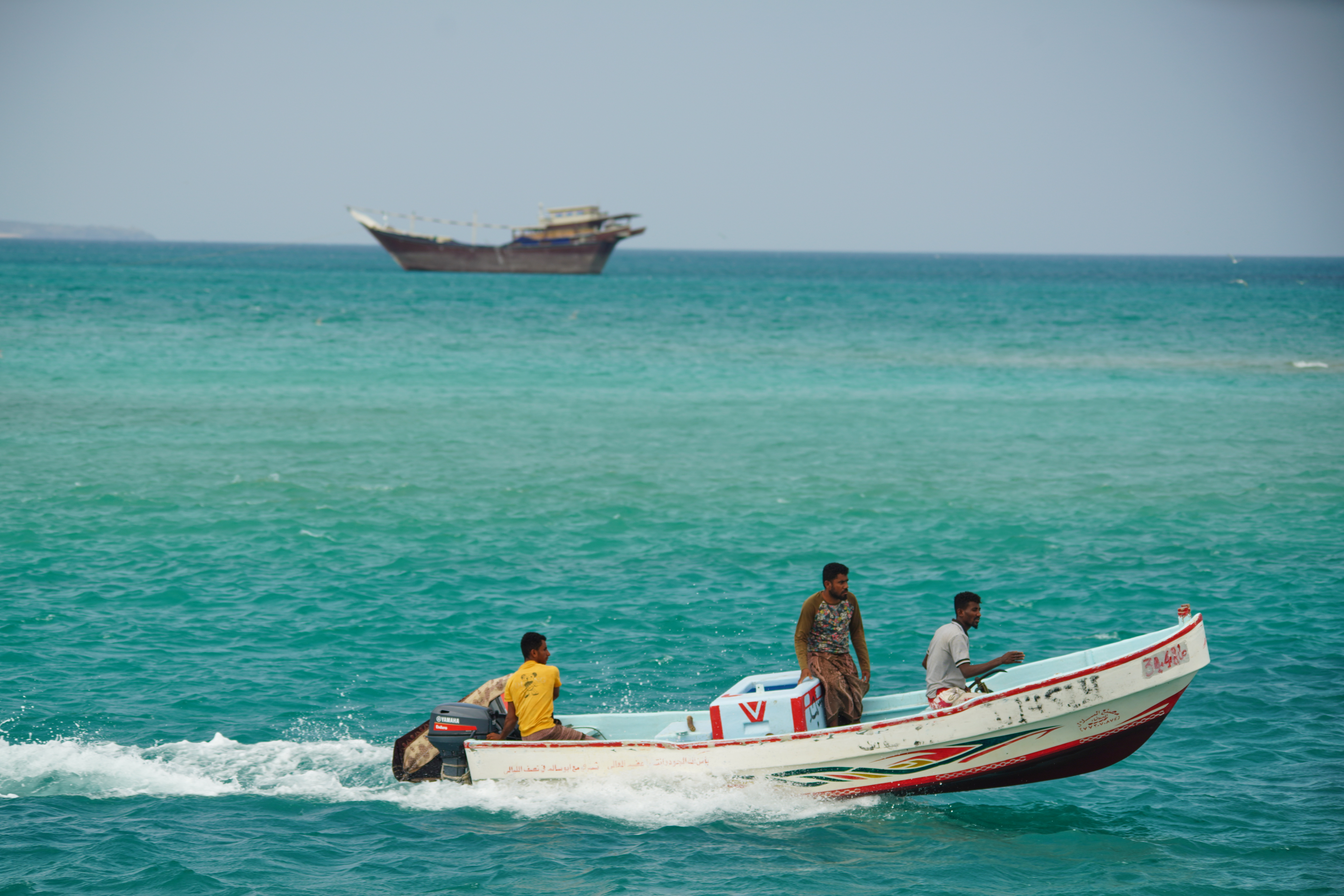 Yemeni fishermen sail in the waters overlooking the strategic Bab el-Mandeb Strait, Yemen, Sunday, April 5, 2026. (AP Photo/Abdulnasser Alseddik)