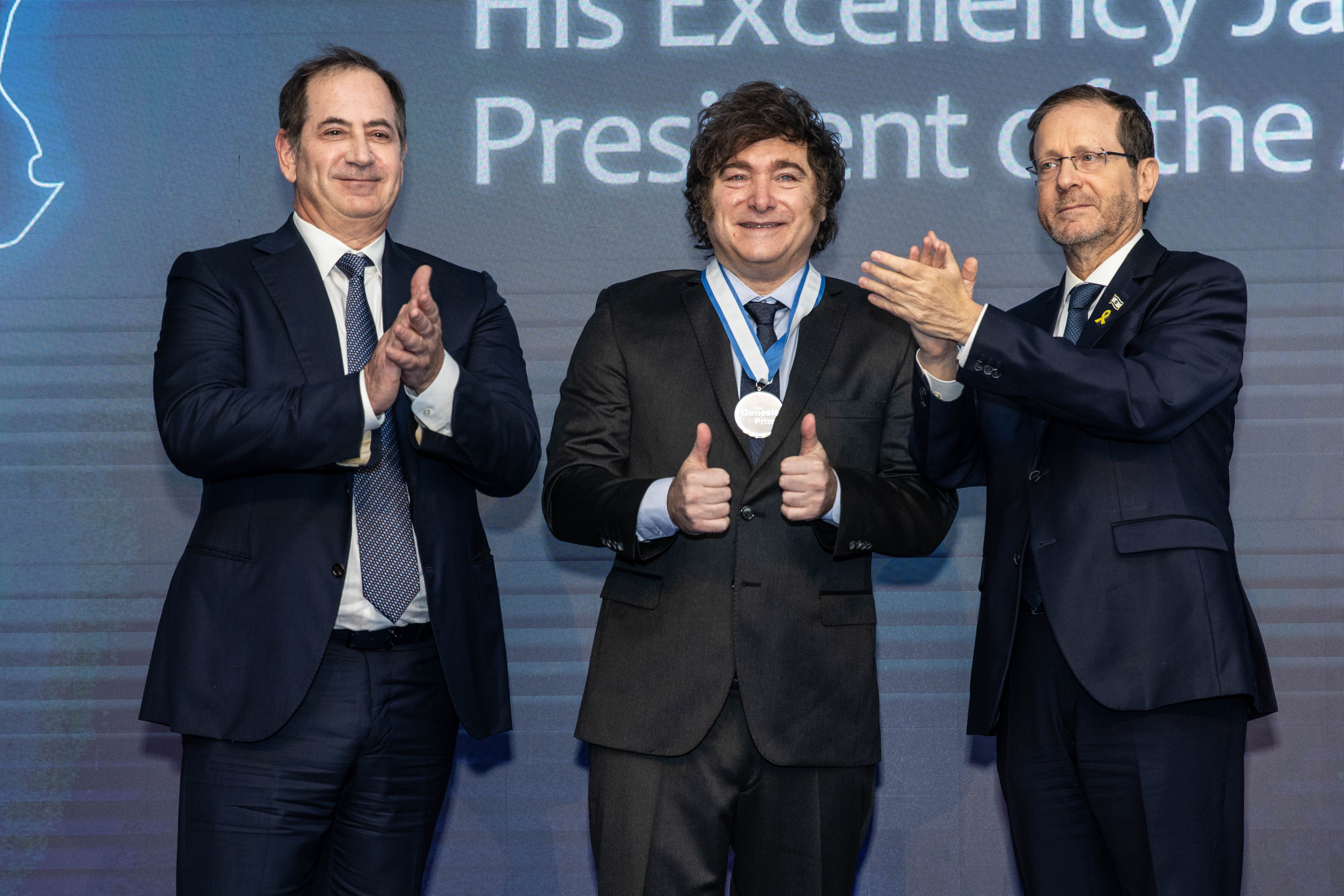 JERUSALEM, ISRAEL - JUNE 12: President of Argentina Javier Milei (C) poses with Businessman Stan Polovets (L) and President of Israel Isaac Herzog (R) during the Genesis Prize ceremony at The Museum of Tolerance on June 12, 2025 in Jerusalem, Israel. (Photo by Lior Mizrahi/Getty Images for Genesis Prize Foundation)