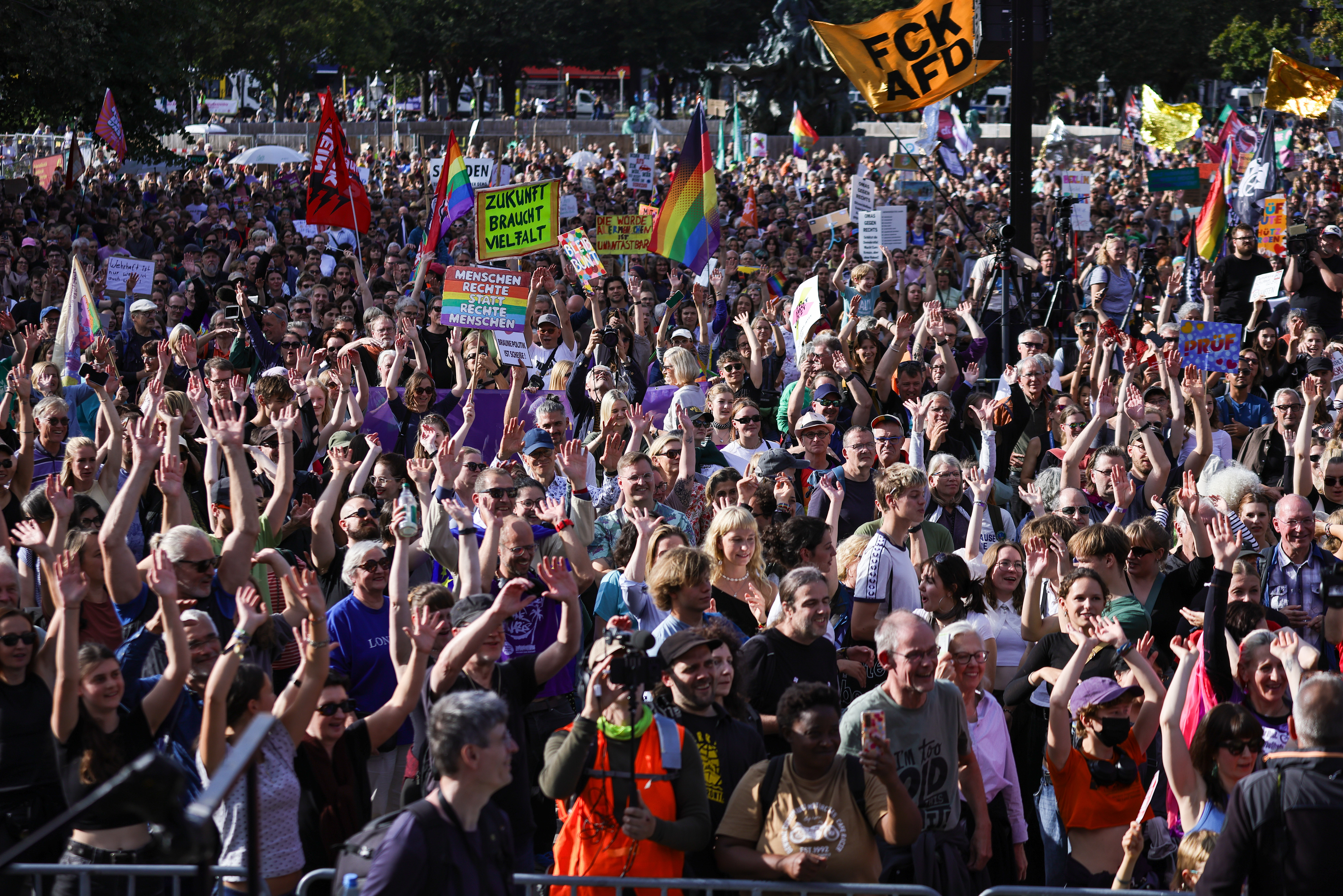 BERLIN, GERMANY - SEPTEMBER 12: People gather in a pro-democracy and anti-far-right demonstration in front of the Rotes Rathaus city hall on September 12, 2026 in Berlin, Germany. Similar demonstrations are taking place across Germany today following the recent win by the far-right Alternative for Germany (AfD) in state elections in Saxony-Anhalt, where the AfD received nearly 44% of the vote. Two more state elections are scheduled for September 20, including in Berlin. The AfD will likely fair well in both, according to the latest polls. (Photo by Omer Messinger/Getty Images)