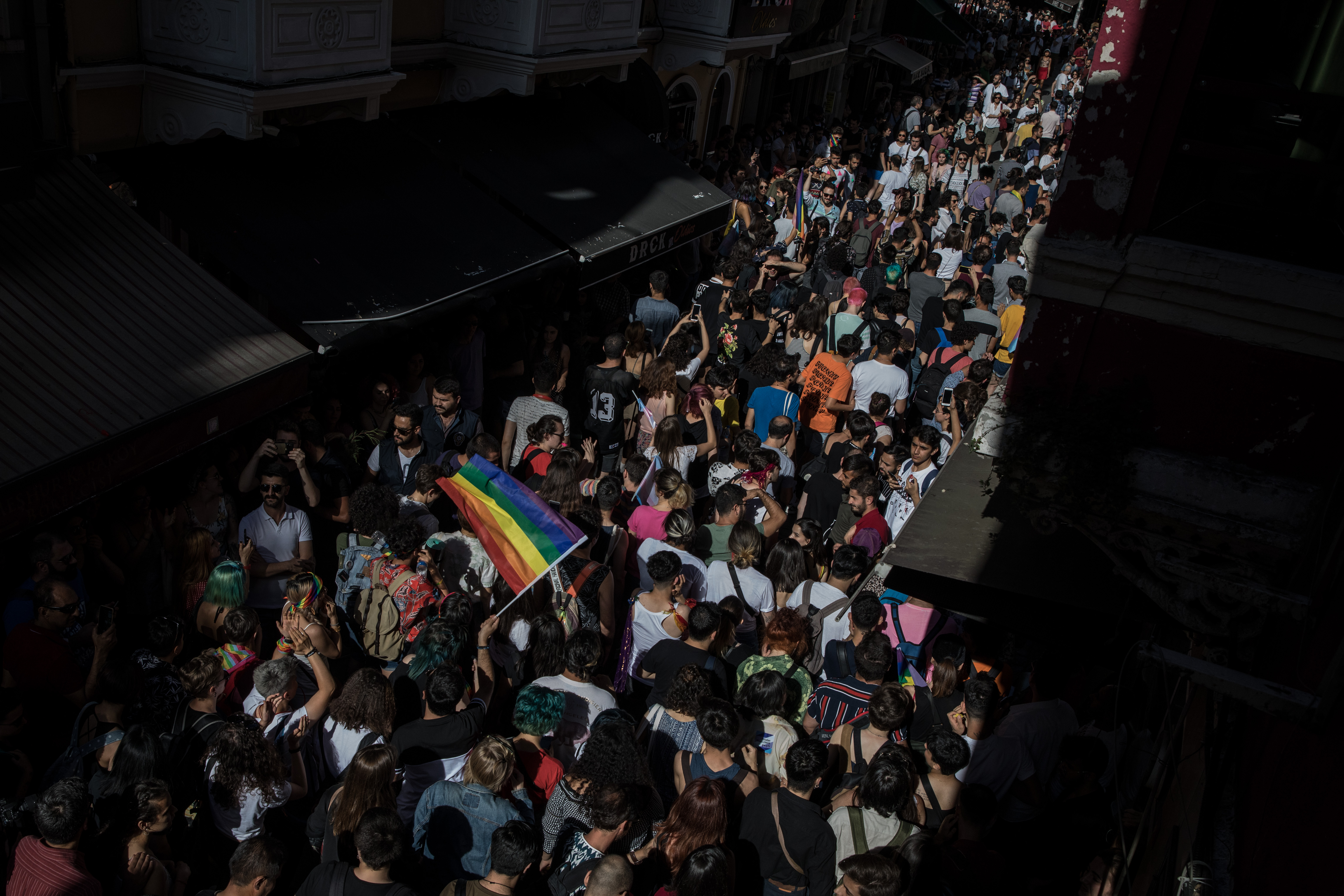 Pro-LGBTQ demonstrators walk down a street in Istanbul, Turkiye, on June 30, 2019, after authorities banned the Pride March for the fifth year running