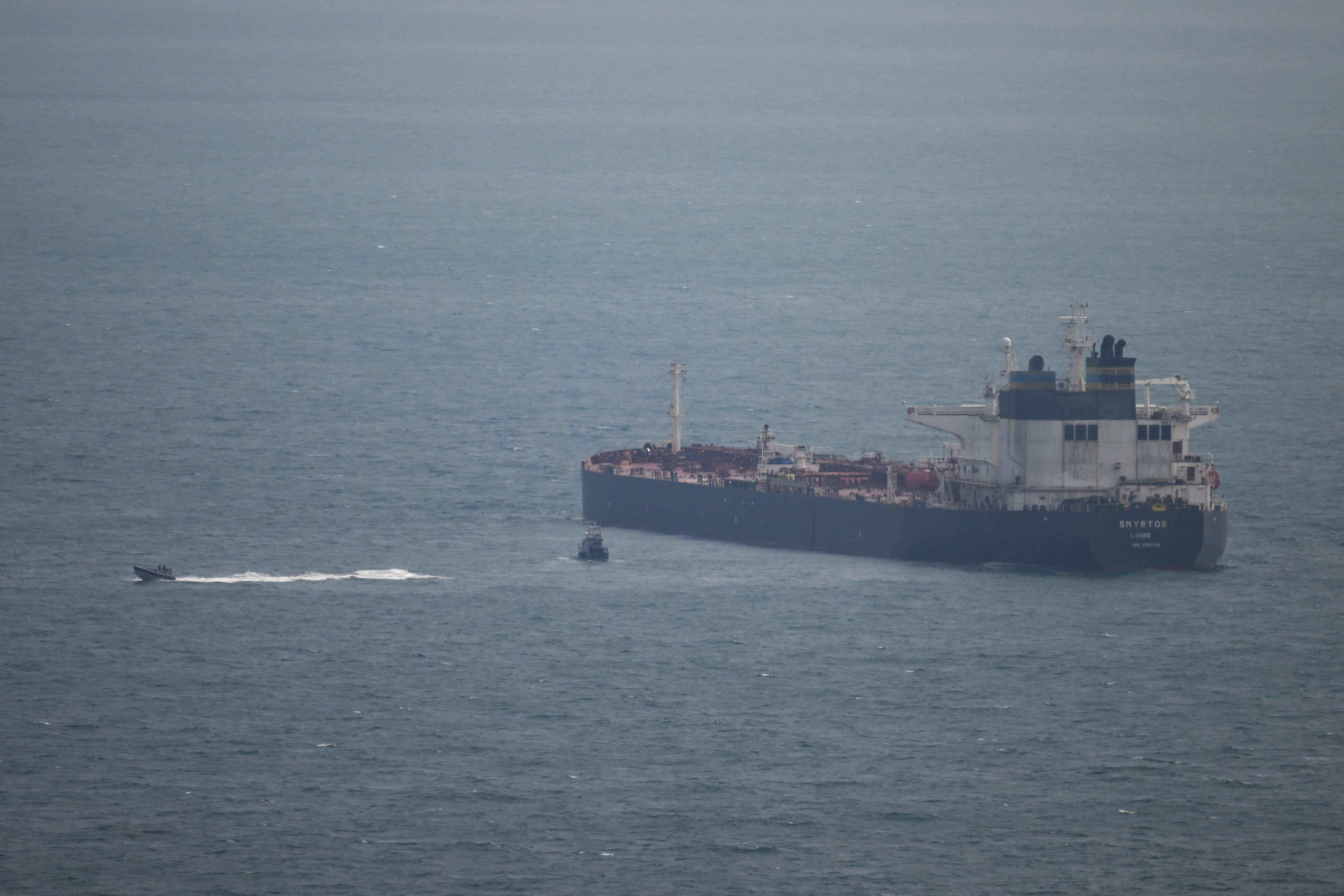 An oil tanker operating as part of Russia’s shadow fleet is intercepted by British forces in the English Channel, in Portland, England, on June 15, 2026