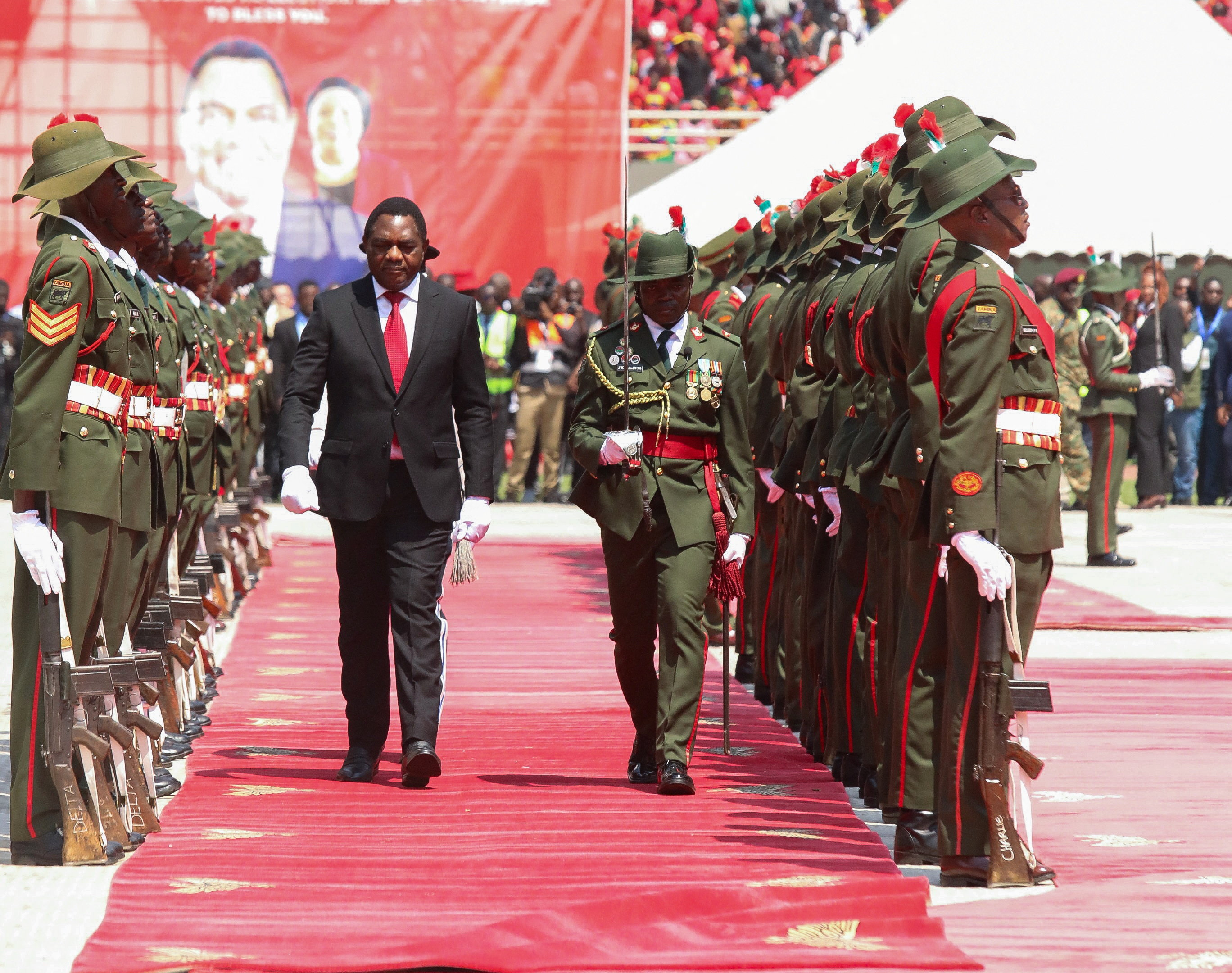 Zambia's President Hakainde Hichilema inspects the guard of honour on the day of his swearing-in ceremony in Lusaka, Zambia