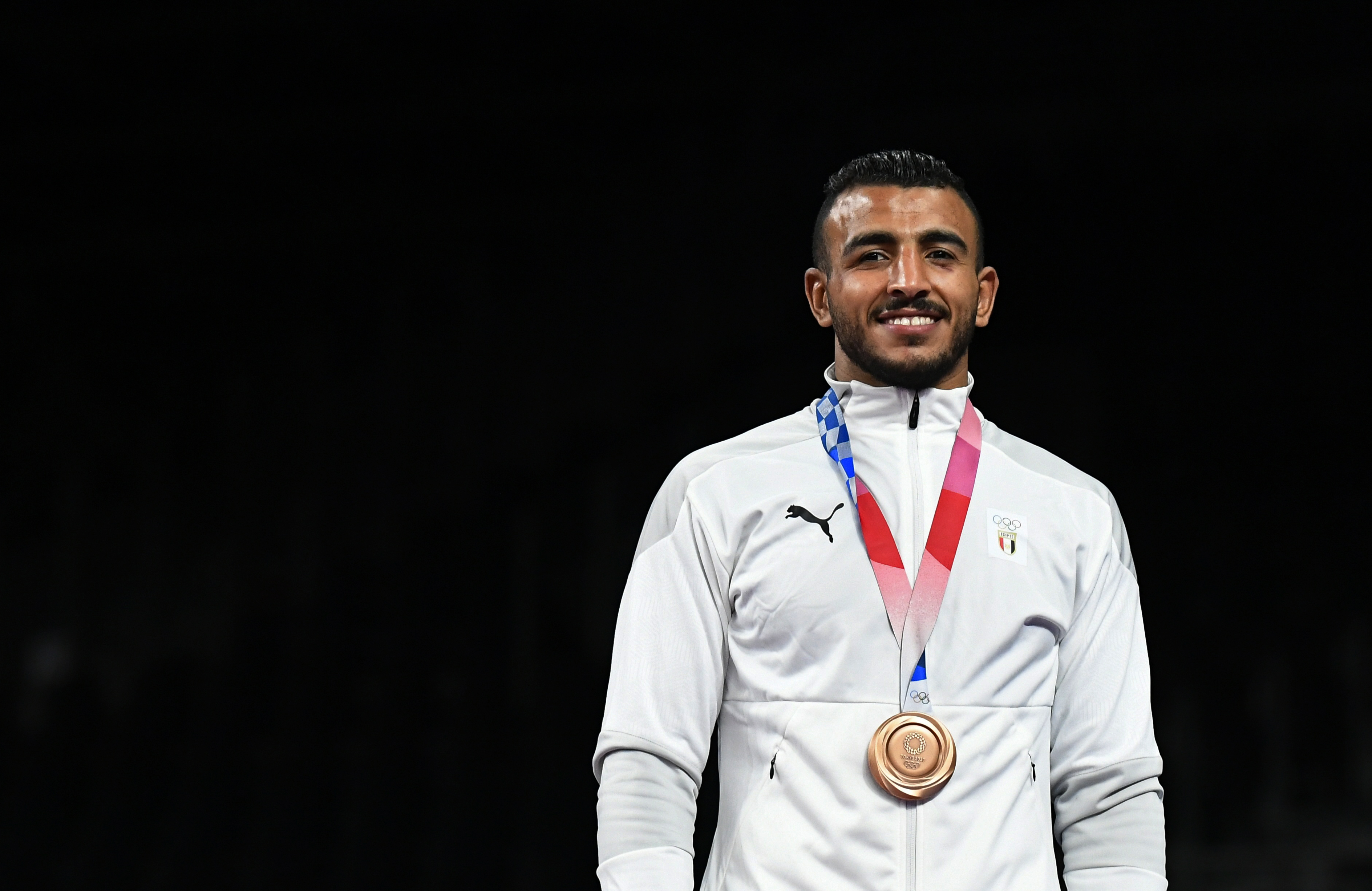 Tokyo 2020 Olympics - Wrestling - Greco-Roman - Men's 67kg - Medal Ceremony - Makuhari Messe Hall A, Chiba, Japan - August 4, 2021. Bronze medallist Mohamed Ibrahim Elsayed of Egypt poses with his medal REUTERS/Piroschka Van De Wouw