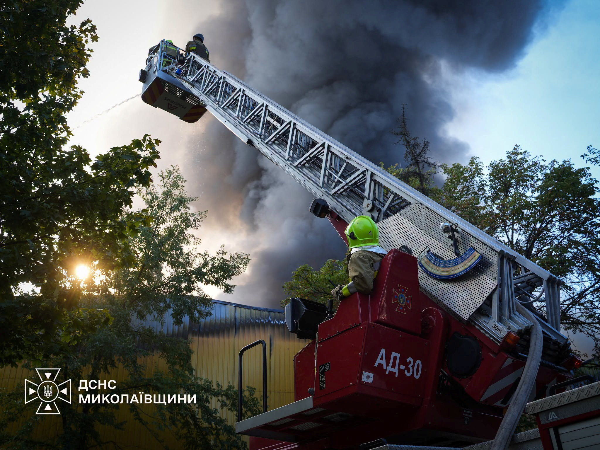 Firefighters work at the site of a warehouse hit during Russian drone and air strikes, amid Russia's attack on Ukraine, in Mykolaiv, Ukraine September 9, 2026. Press service of the State Emergency Service of Ukraine in Mykolaiv region/Handout via REUTERS ATTENTION EDITORS - THIS IMAGE HAS BEEN SUPPLIED BY A THIRD PARTY.