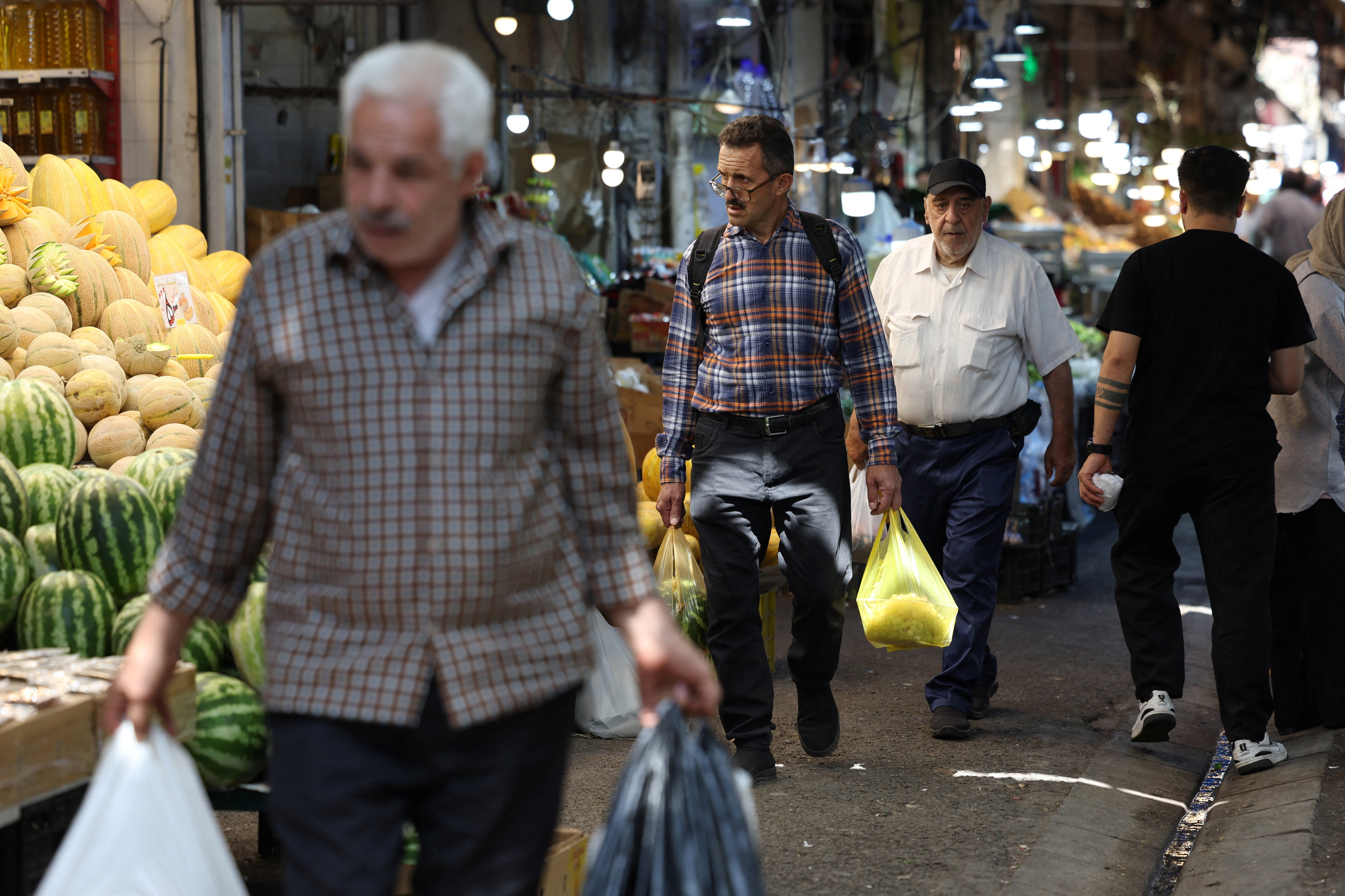 People walk at a local market in Tehran, Iran, September 9, 2026. Majid Asgaripour/WANA (West Asia News Agency) via REUTERS ATTENTION EDITORS - THIS PICTURE WAS PROVIDED BY A THIRD PARTY. ISRAEL OUT. NO COMMERCIAL OR EDITORIAL SALES IN ISRAEL. NO ACCESS FOR ISRAELI MEDIA. NO USE BBC PERSIAN. NO USE VOA PERSIAN. NO USE MANOTO. NO USE IRAN INTERNATIONAL. NO USE RADIO FARDA. DIGITAL: NO USE BBC PERSIAN. NO USE VOA PERSIAN. NO USE MANOTO. NO USE IRAN INTERNATIONAL. NO USE RADIO FARDA.