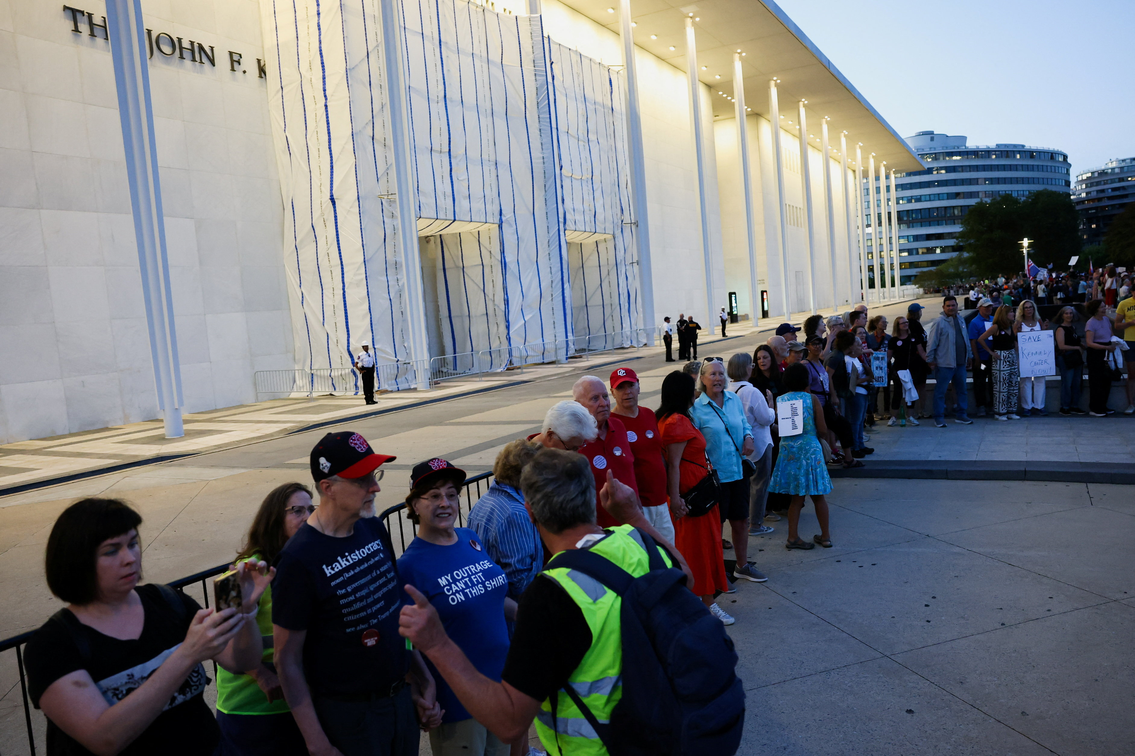 People attend a protest to denounce the Kennedy Center board's vote to close one of the nation's premier performing arts venues, outside the John F. Kennedy Memorial Center for the Performing Arts in Washington, D.C., US, September 18, 2026. REUTERS/Leah Millis