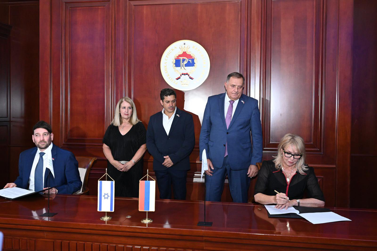 Israeli Ambassador to Bosnia and Herzegovina and Albania Galit Peleg (L), Diaspora Affairs Minister Amichai Chikli (C) and Milorad Dodik attend the inauguration of the Israel Chamber of Commerce representative office in Banja Luka, Republika Srpska