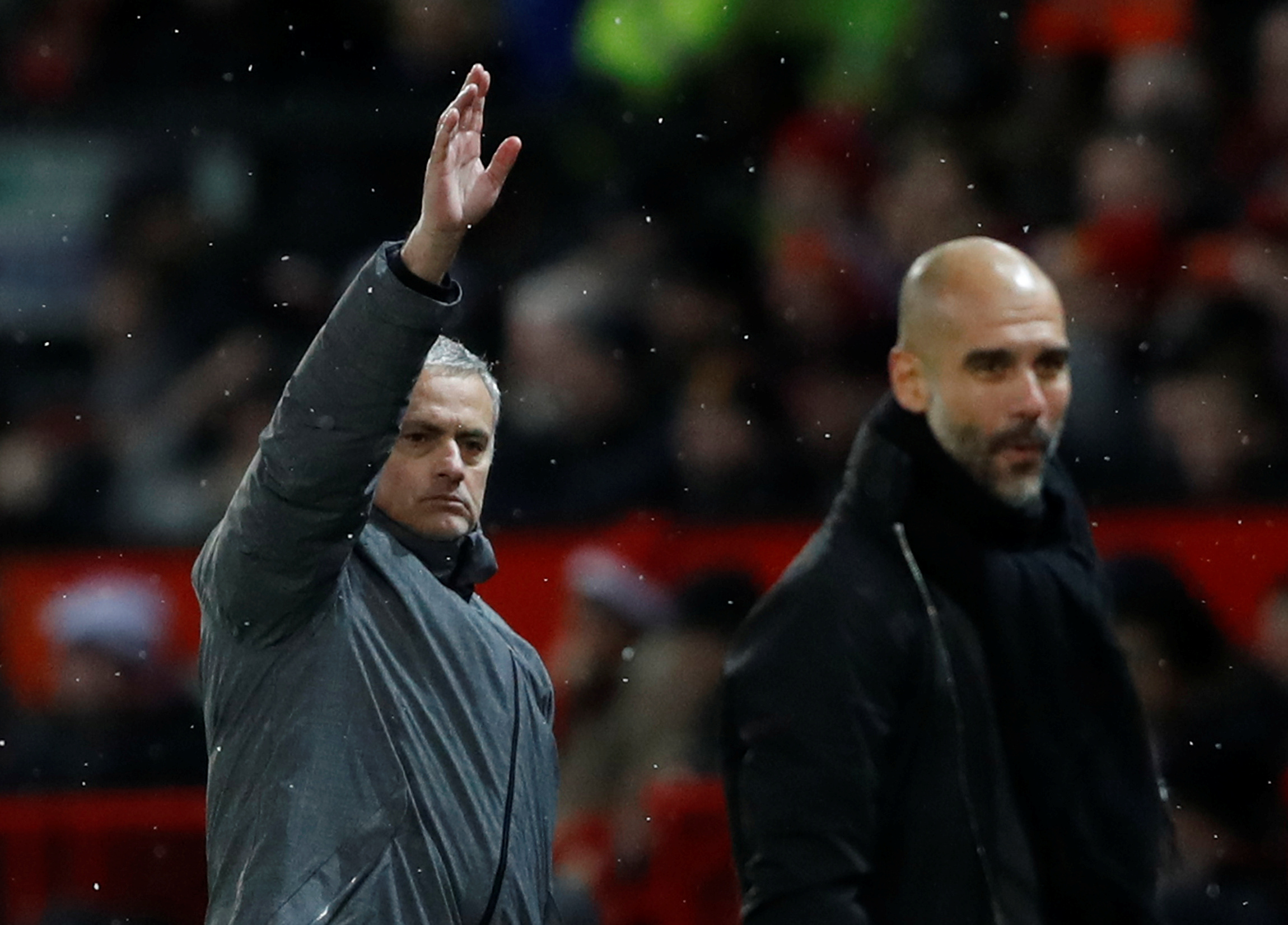 Manchester City manager Pep Guardiola and Manchester United manager Jose Mourinho in Premier League action
