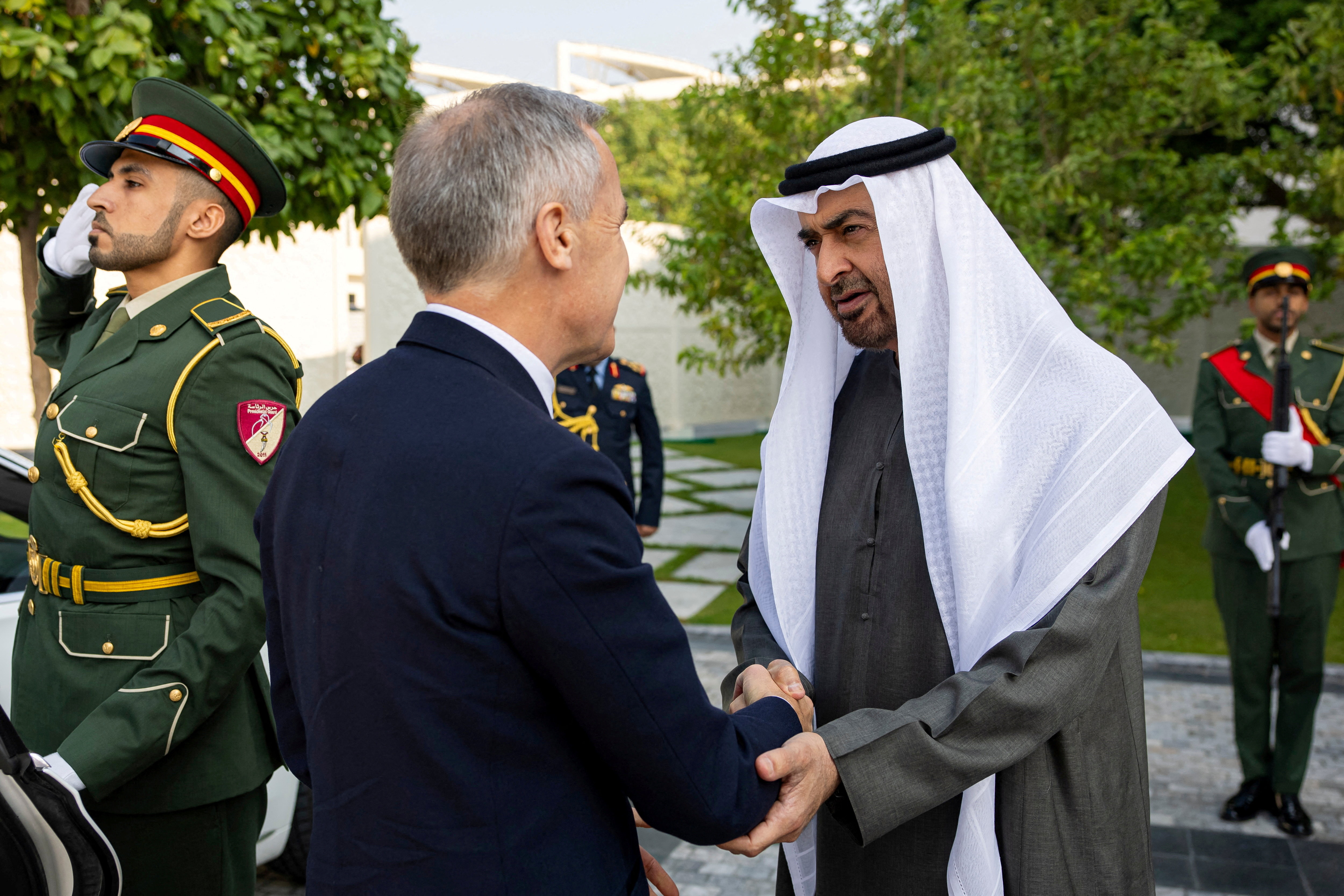 Sheikh Mohamed bin Zayed Al Nahyan, President of the United Arab Emirates, receives Canadian Prime Minister Mark Carney before a meeting