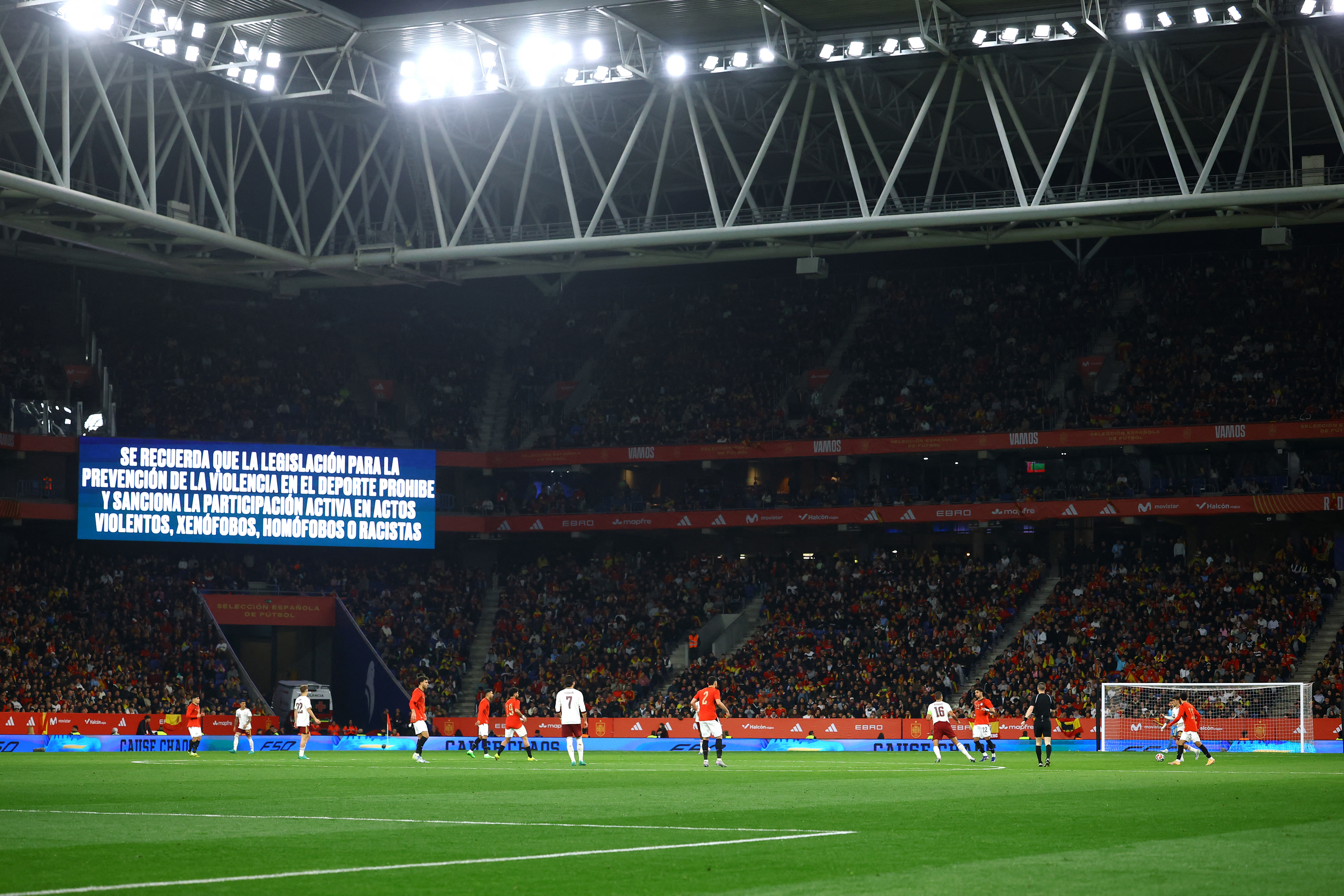 A big screen displays an anti-discrimination message inside the RCDE Stadium, Cornella de Llobregat, Spain, during the match between Spain and Egypt, March 31, 2026