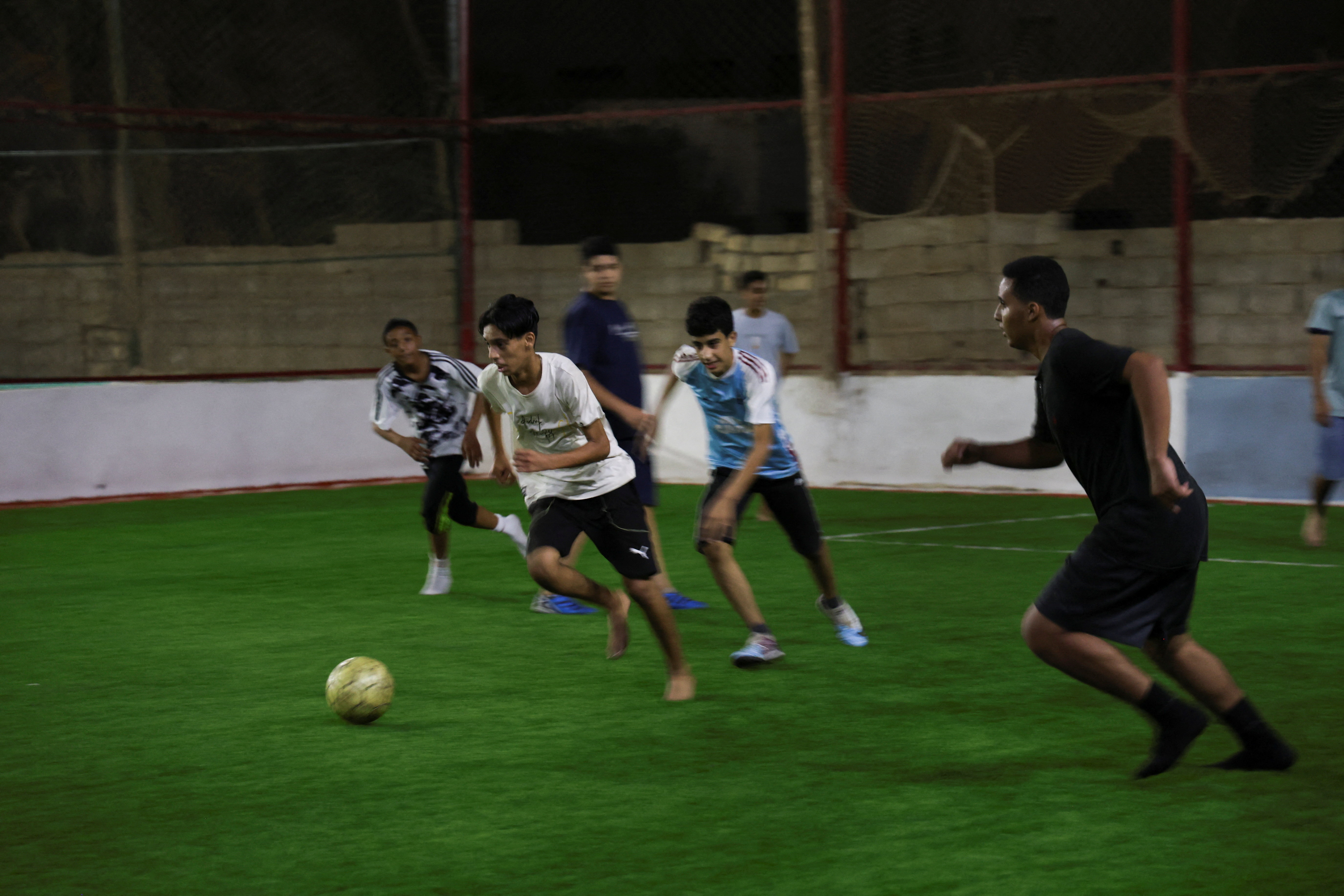 Young people play soccer during school closures caused by a teachers' sit-in demanding higher salaries, in Benghazi, Libya, September 27, 2026. REUTERS/Esam Omran Al-Fetori