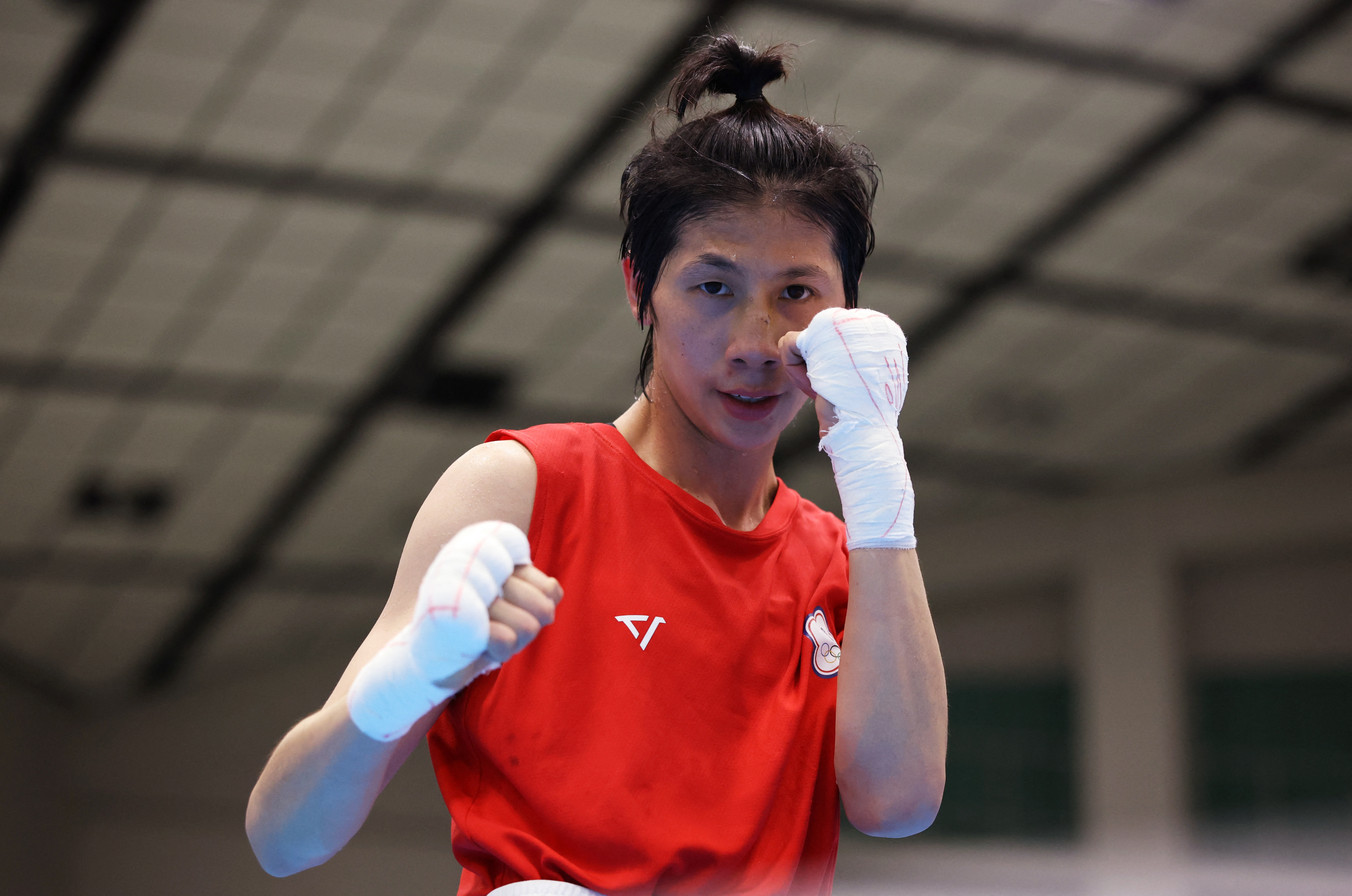 Taiwan's Lin Yu-ting celebrates after winning the 2026 Asian Games gold medal in the women's 60kg final [Andrew Boyers/Reuters]