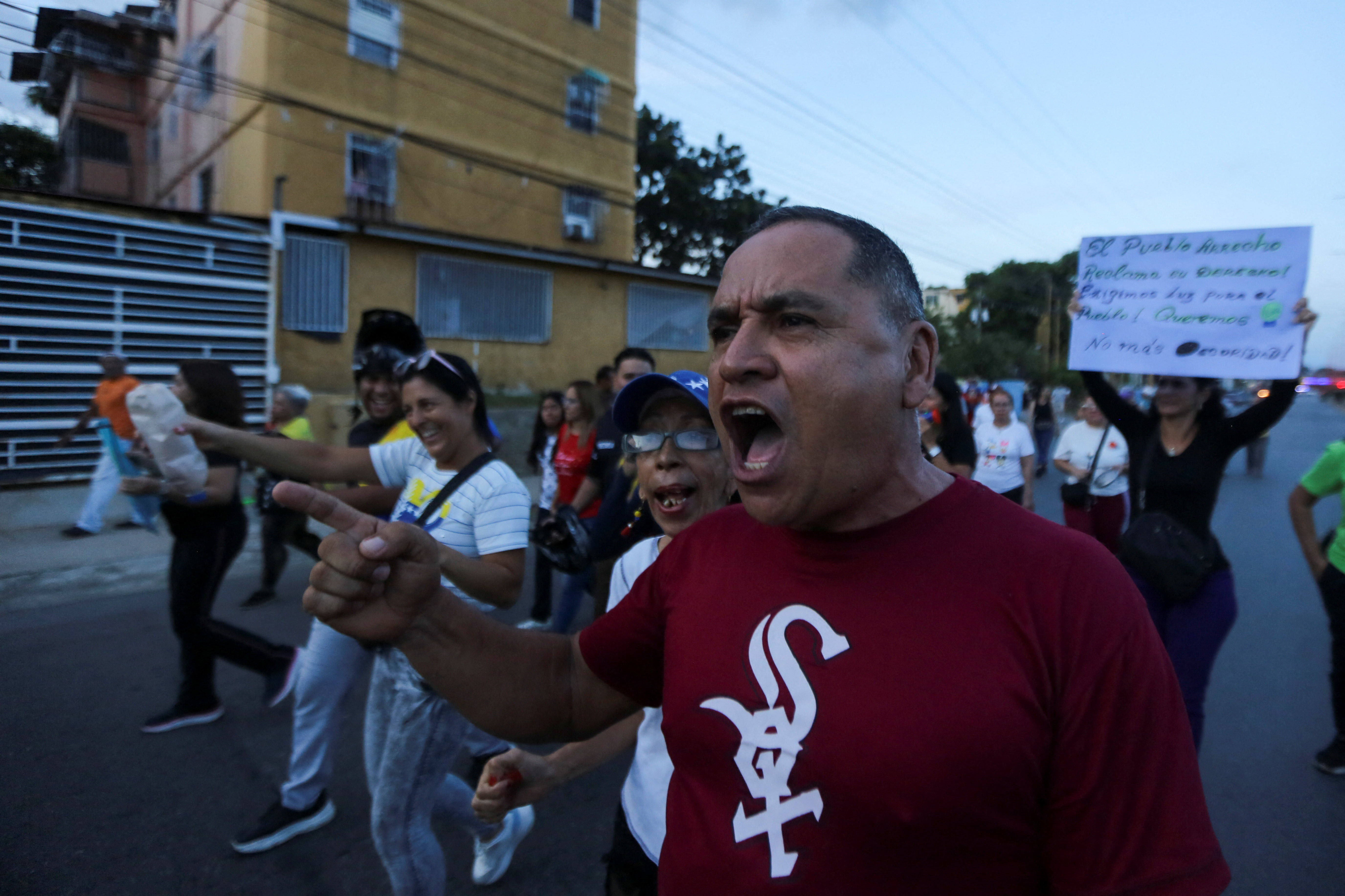 Demonstrators take part in a protest against prolonged power outages in Valencia, Venezuela, October 2, 2026. REUTERS/Juan Carlos Hernandez