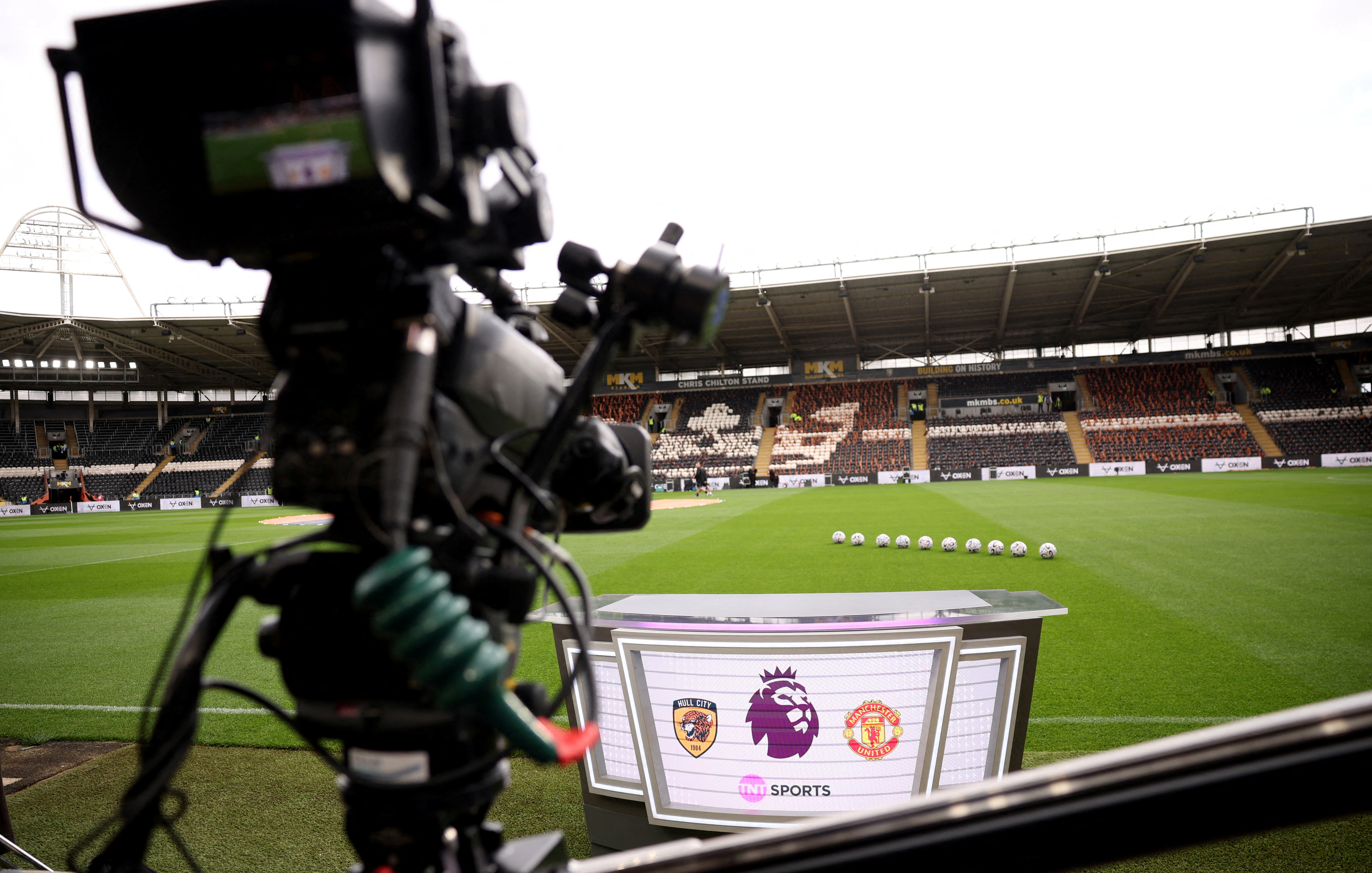 General view of the TV camera and pundit desk inside the stadium before a Manchester United match in the Premier League