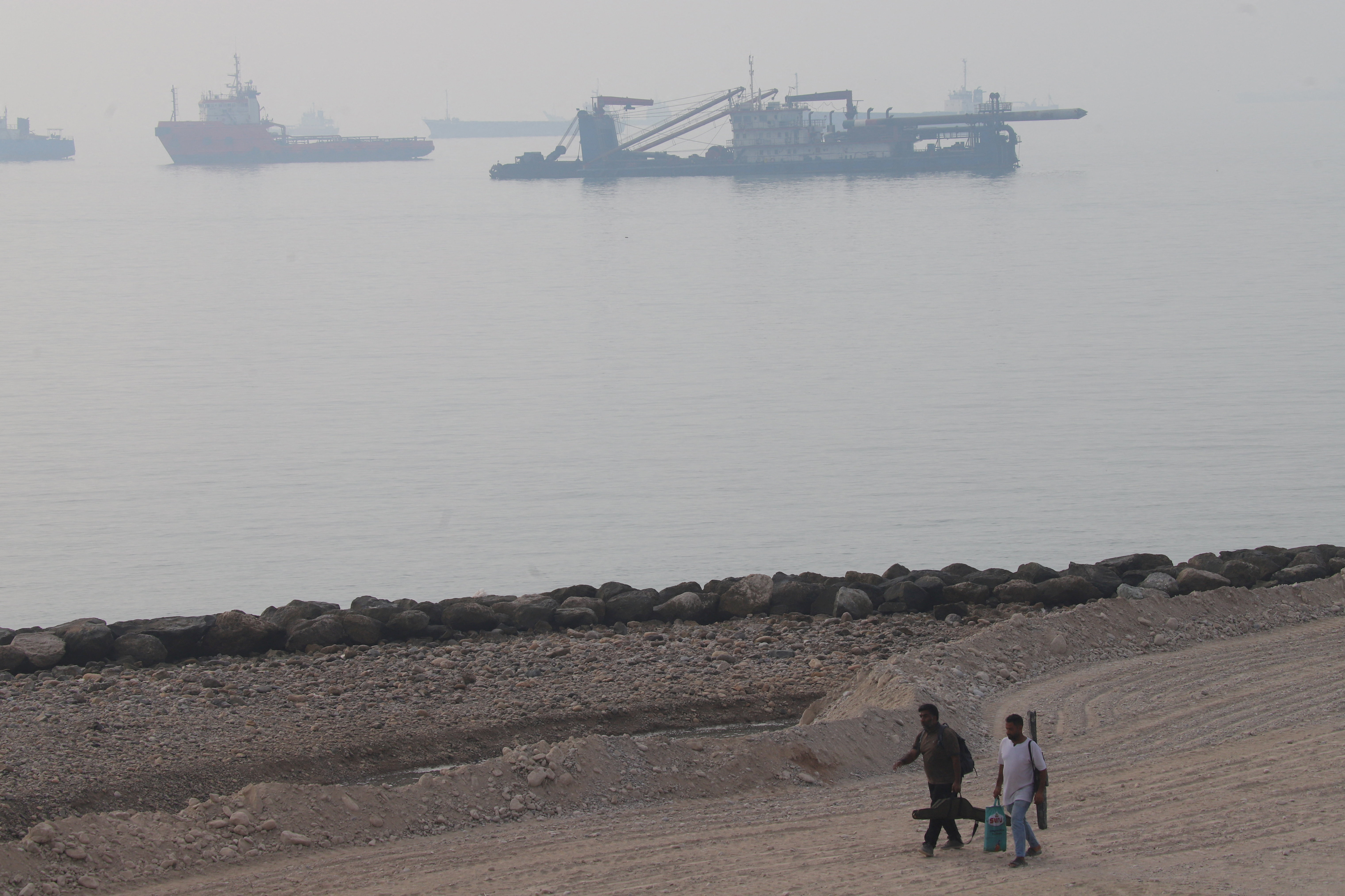 Vessels in the Strait of Hormuz near the beach of Bandar Abbas, Iran, October 6, 2026. Amirhosein Khorgooi/ISNA/via WANA (West Asia News Agency) via REUTERS ATTENTION EDITORS - THIS PICTURE WAS PROVIDED BY A THIRD PARTY. ATTENTION EDITORS - THIS PICTURE WAS PROVIDED BY A THIRD PARTY. ISRAEL OUT. NO COMMERCIAL OR EDITORIAL SALES IN ISRAEL. NO ACCESS FOR ISRAELI MEDIA. NO USE BBC PERSIAN. NO USE VOA PERSIAN. NO USE MANOTO. NO USE IRAN INTERNATIONAL. NO USE RADIO FARDA. DIGITAL: NO USE BBC PERSIAN. NO USE VOA PERSIAN. NO USE MANOTO. NO USE IRAN INTERNATIONAL. NO USE RADIO FARDA.