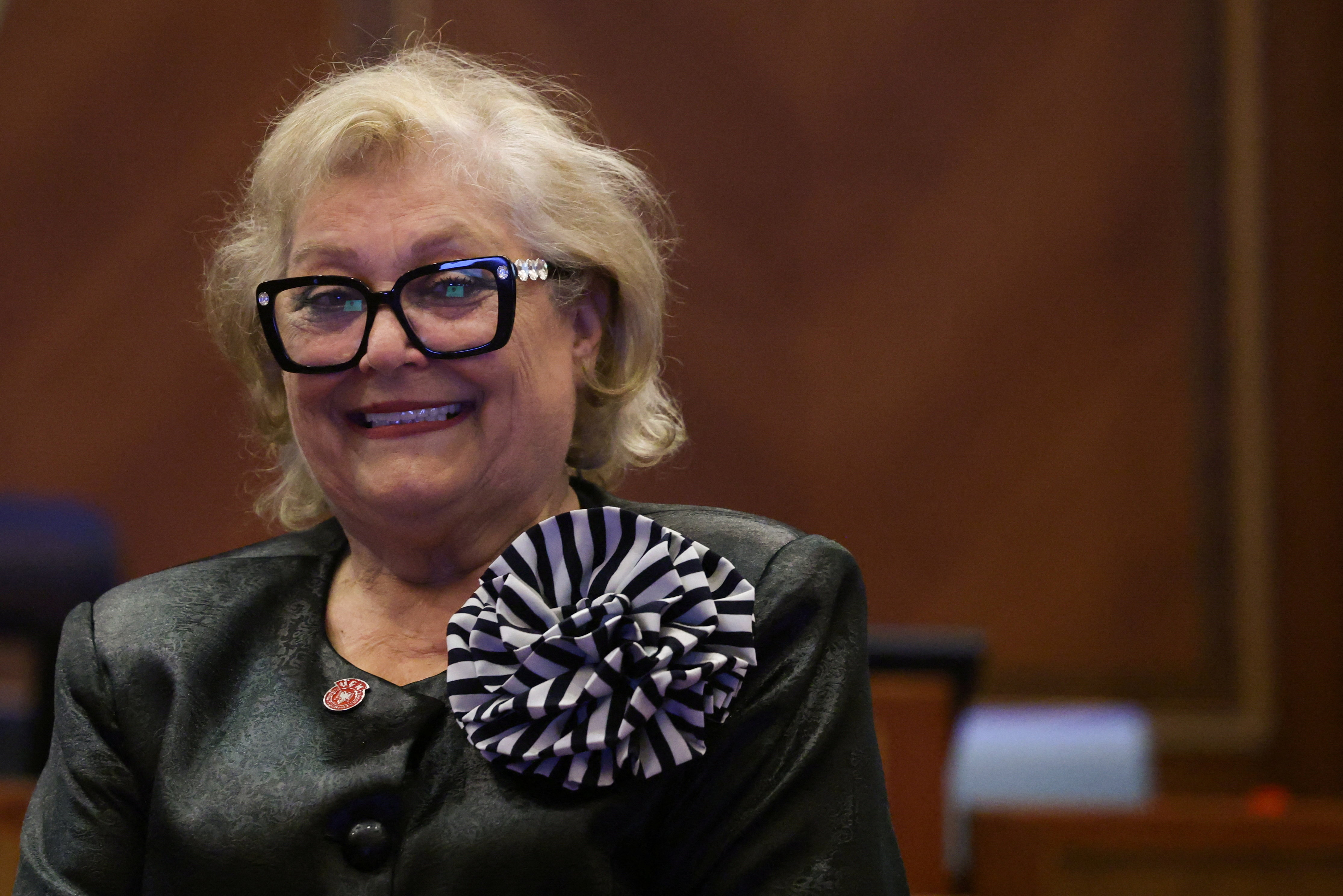 The newly elected president of the Republic of Kosovo, Justina Shiroka Pula, poses for pictures.