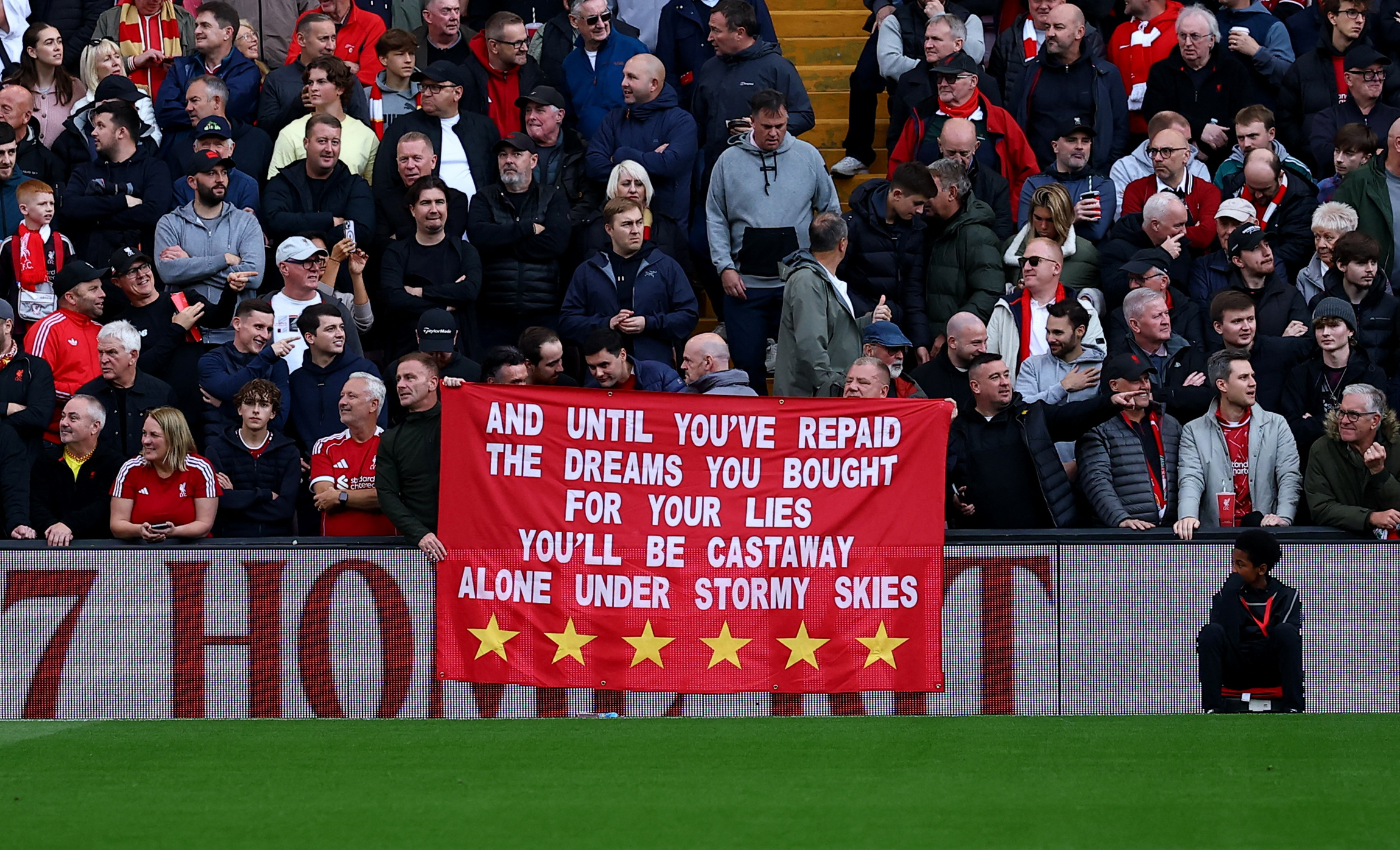 Soccer Football - Premier League - Liverpool v Manchester City - Anfield, Liverpool, Britain - October 11, 2026 Liverpool fans with a banner related to the Manchester City's Premier League charges inside the stadium before the match REUTERS/Phil Noble EDITORIAL USE ONLY. NO USE WITH UNAUTHORIZED AUDIO, VIDEO, DATA, FIXTURE LISTS, CLUB/LEAGUE LOGOS OR 'LIVE' SERVICES. ONLINE IN-MATCH USE LIMITED TO 120 IMAGES, NO VIDEO EMULATION. NO USE IN BETTING, GAMES OR SINGLE CLUB/LEAGUE/PLAYER PUBLICATIONS. PLEASE CONTACT YOUR ACCOUNT REPRESENTATIVE FOR FURTHER DETAILS..