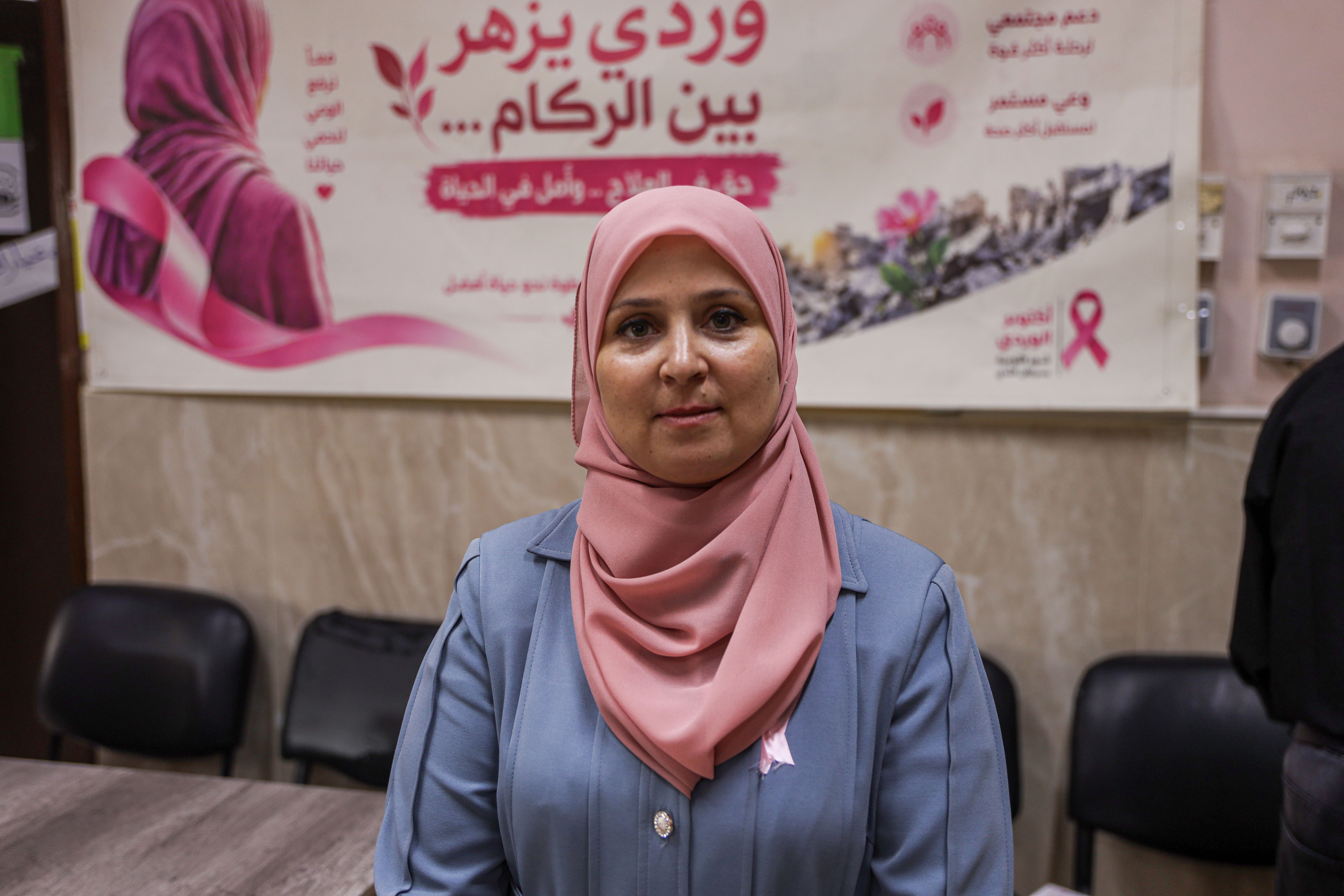 Iman al-Haj Ahmad, a doctor diagnosed with breast cancer, helps women in Gaza access screening and support while awaiting treatment herself