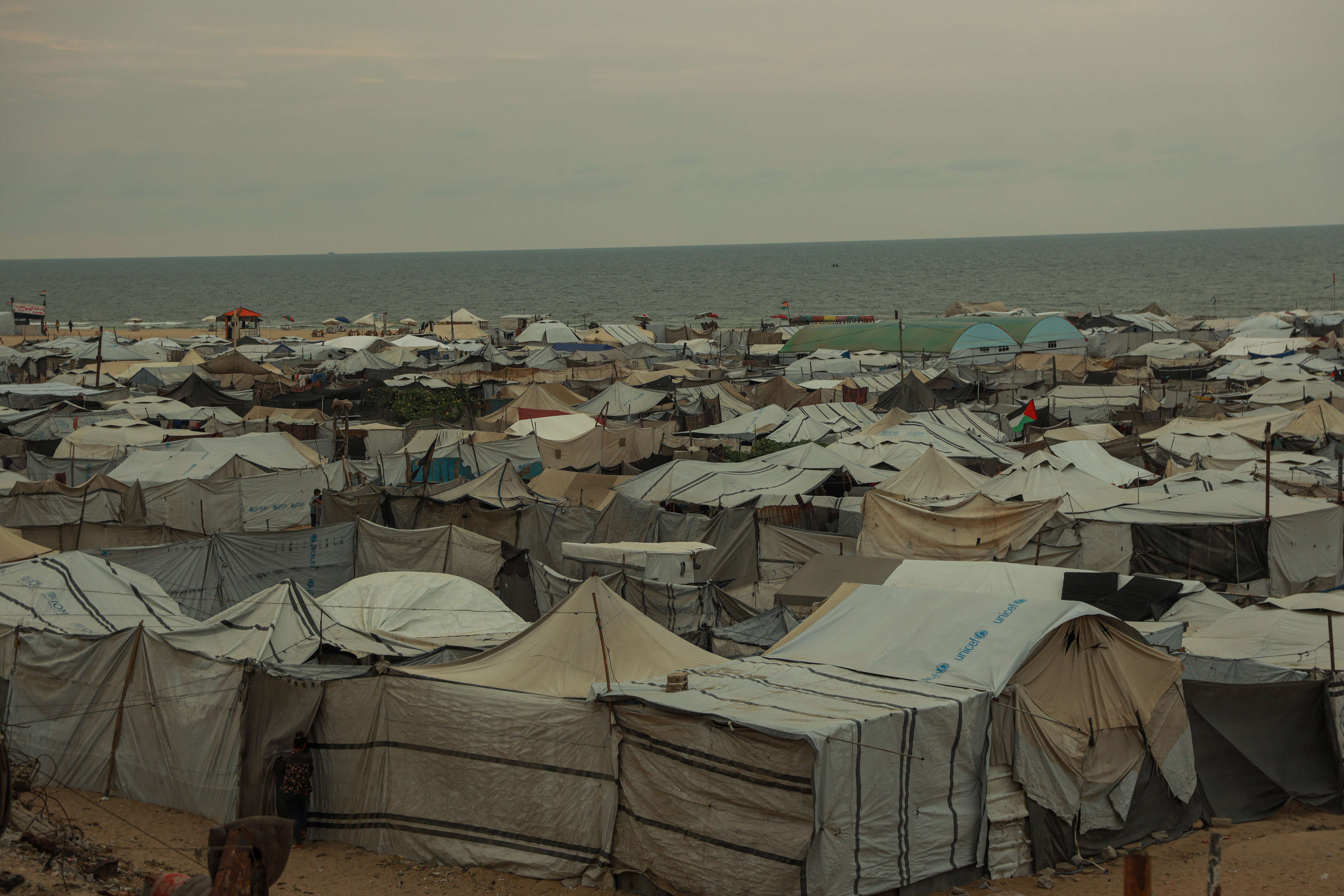 As winter approaches, worn-out tents and shortages of shelter materials leave displaced families in Gaza exposed to the elements