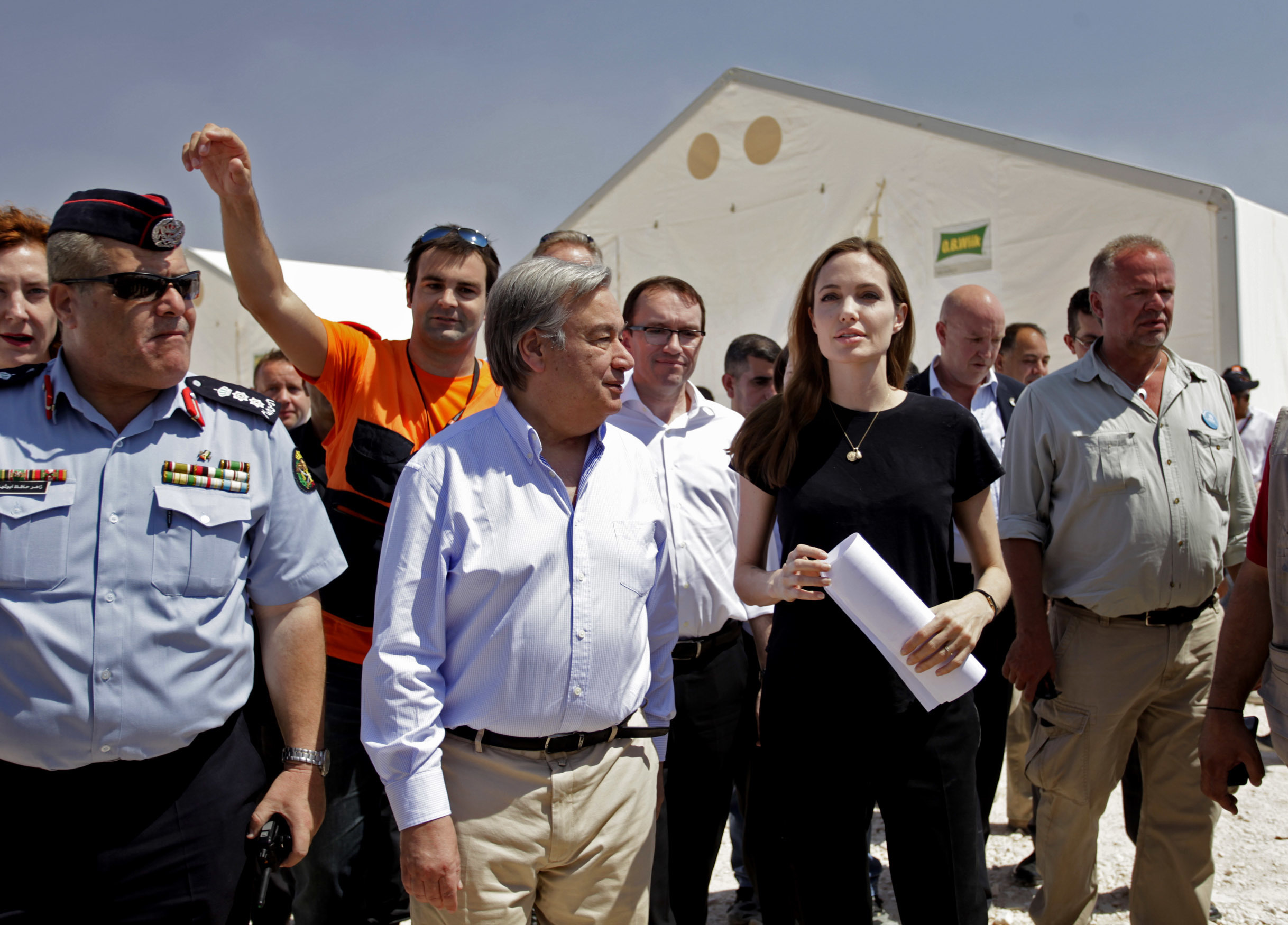 U.N. refugee chief Antonio Guterres, second left, along with UNHCR special envoy, actress Angelina Jolie, second right, visit Zaatari refugee camp, near the Syrian border, in Mafraq, Jordan, in June 2013 [Mohammad Hannon, AP]