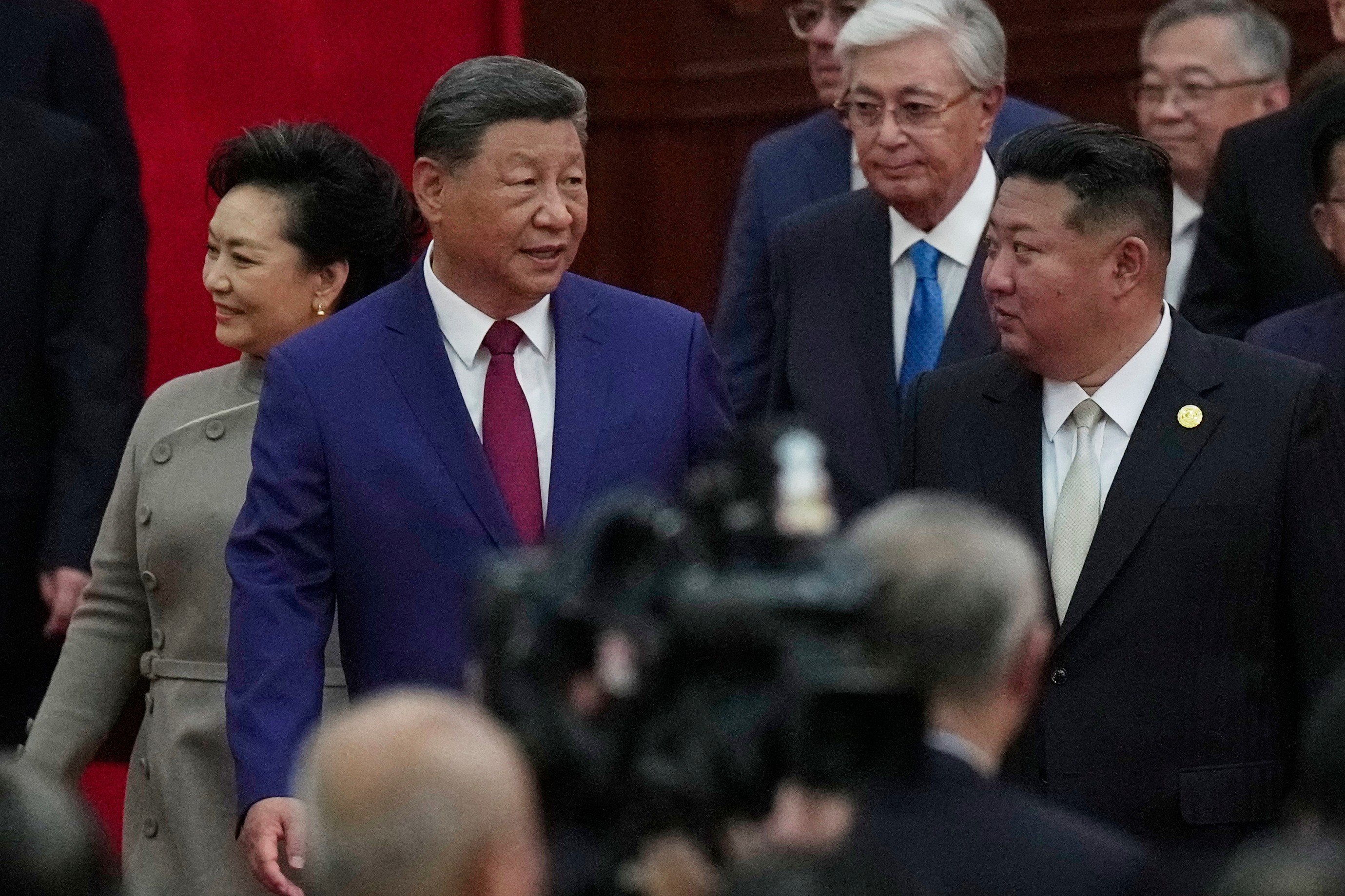 Chinese President Xi Jinping walks with North Korean leader Kim Jong Un, right, to a reception following a military parade to commemorate the 80th anniversary of Japan’s World War II surrender held in front of Tiananmen Gate in Beijing, China, on September 3, 2025