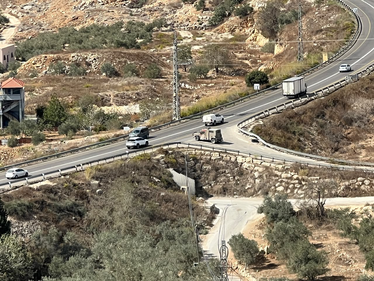 An Israeli army vehicle is closing Madama’s main entrance preventing people from entering and leaving
