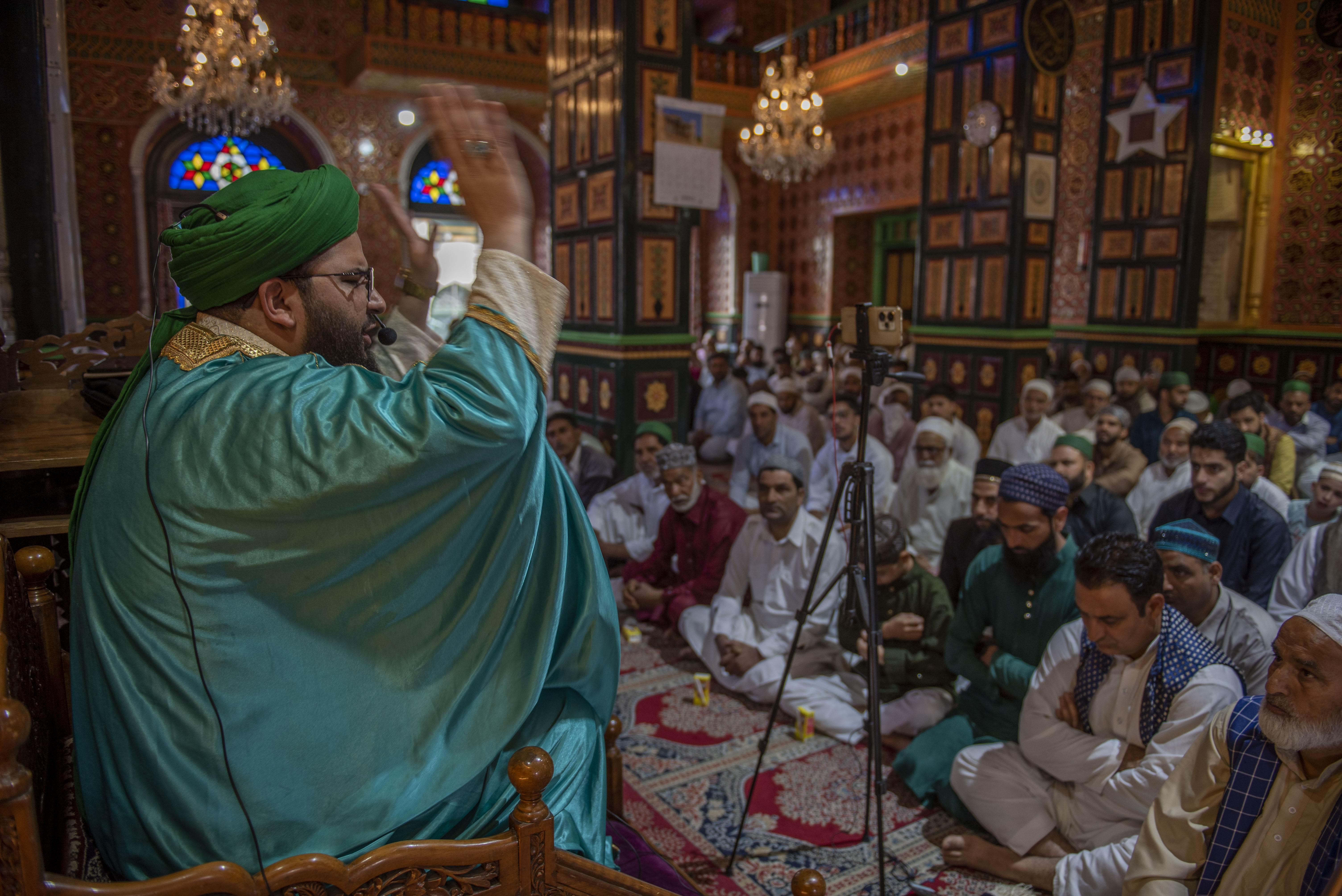 A Kashmiri Muslim cleric delivers sermon before the congregational Eid al-Adha prayers inside the shrine of 11th century sufi preacher Sheikh Abdul Qadir Jeelani on May 27, 2026 in Srinagar, India