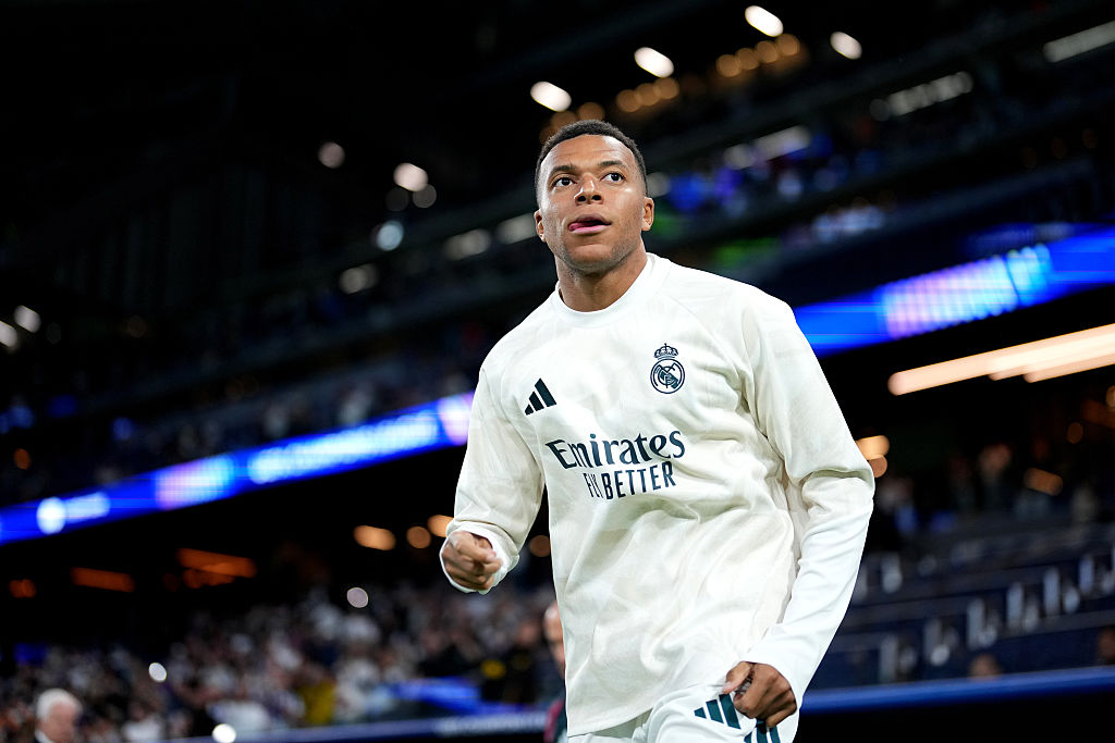 Kylian Mbappe of Real Madrid runs onto the pitch to begin warm ups before the UEFA Champions League 2026/27 League Phase MD3 match