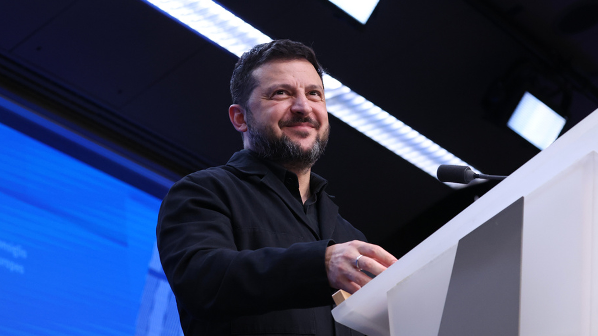 Ukraine's President Volodymyr Zelenskyy smiles while answering a journalists question during a media conference at the EU summit in Brussels, Friday, Oct 16, 2026.