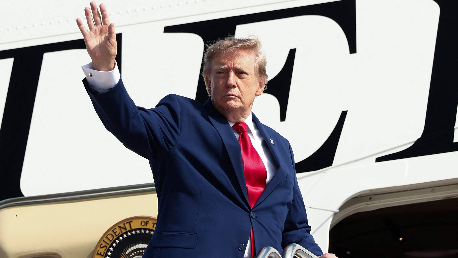US President Donald Trump gestures as he boards Air Force One en route to Georgia for a campaign rally, at Joint Base Andrews, Maryland, US, October 16, 2026. REUTERS