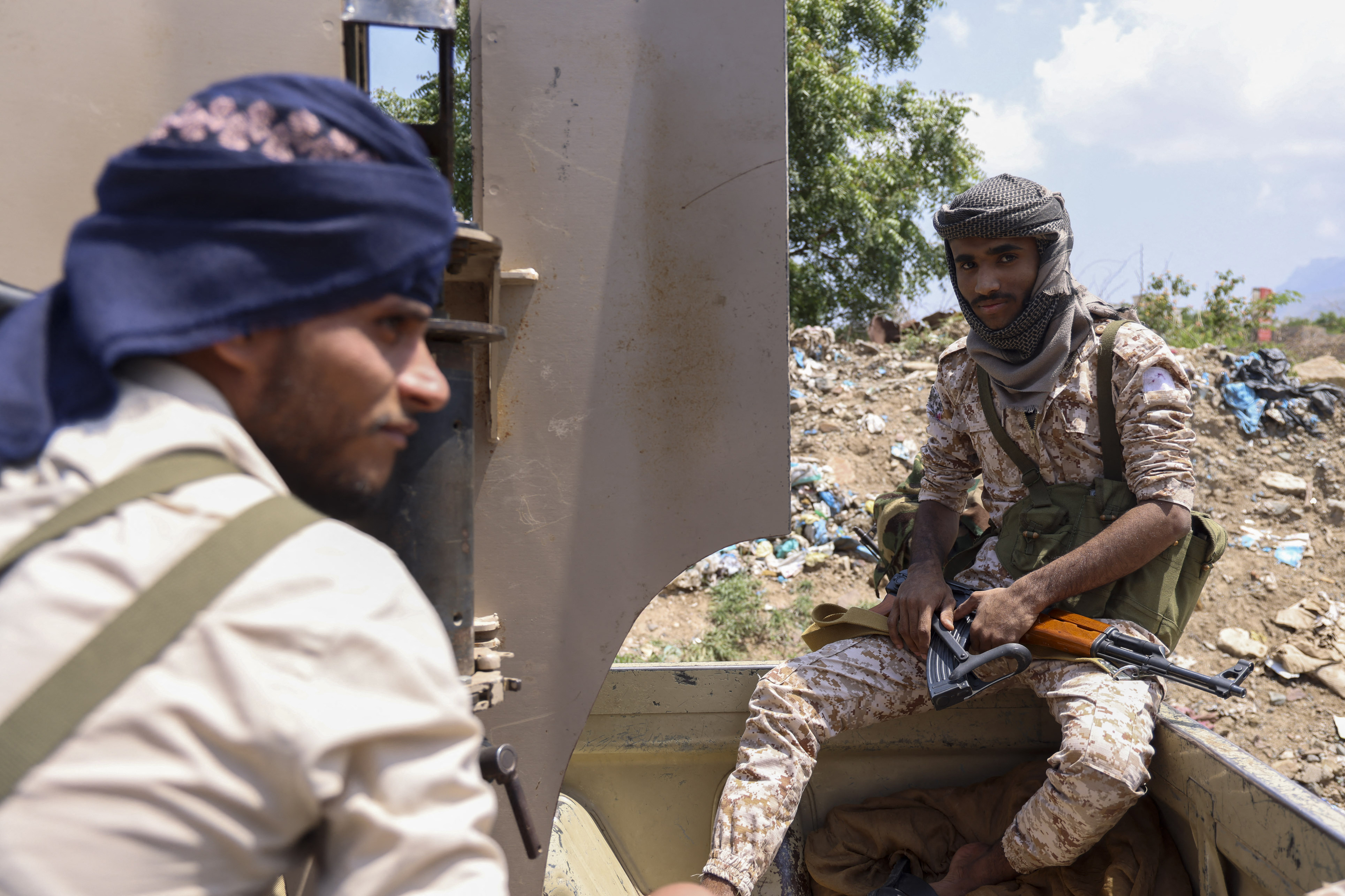 Saudi-backed Yemen government soldiers gather near the Jabal Han front, west of the city of Taiz, following fierce battles earlier in the day as Yemen's Houthis reportedly attempted to seize control of the main route between the inland city of Taiz and the coastal city of Aden, on October 3, 2026.