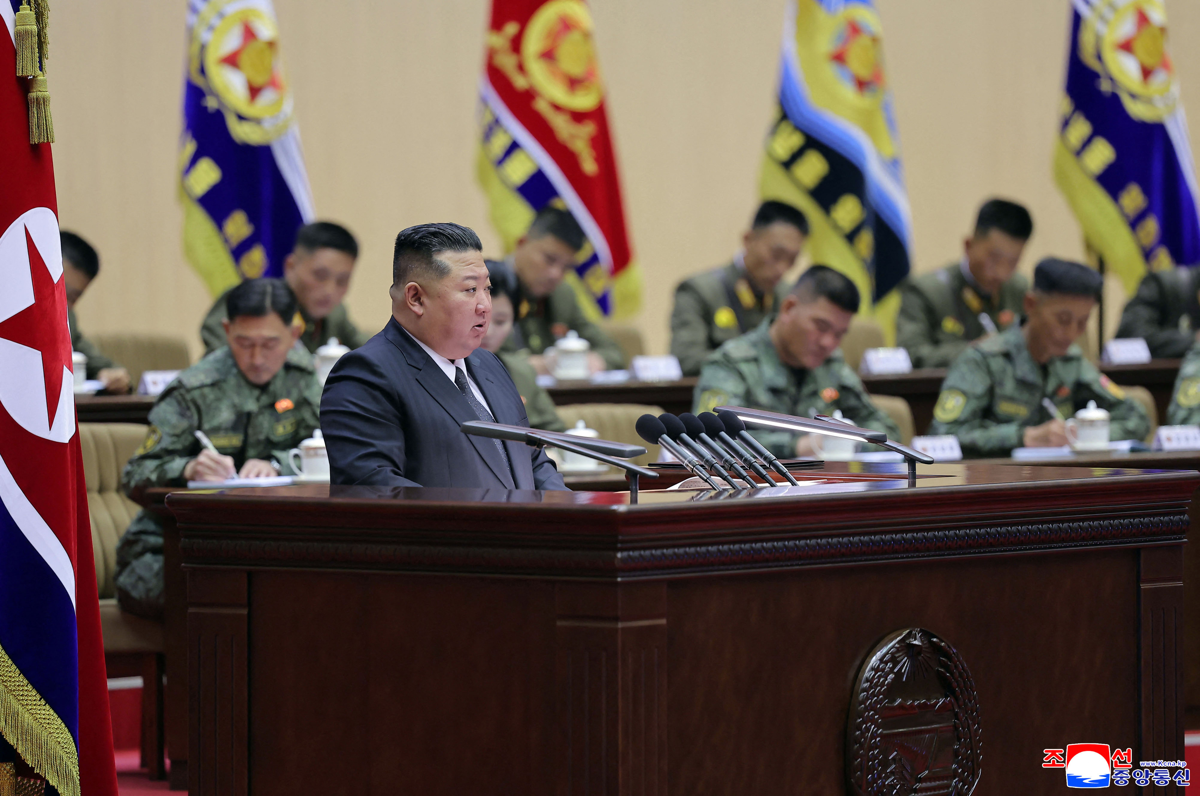 This picture taken between October 22 and 23, 2026 released by North Korea's official Korean Central News Agency (KCNA) on October 24, 2026 shows North Korean leader Kim Jong Un speaking during the third meeting of company leaders of the Korean People's Army at the Pyongyang Gymnasium in Pyongyang.
