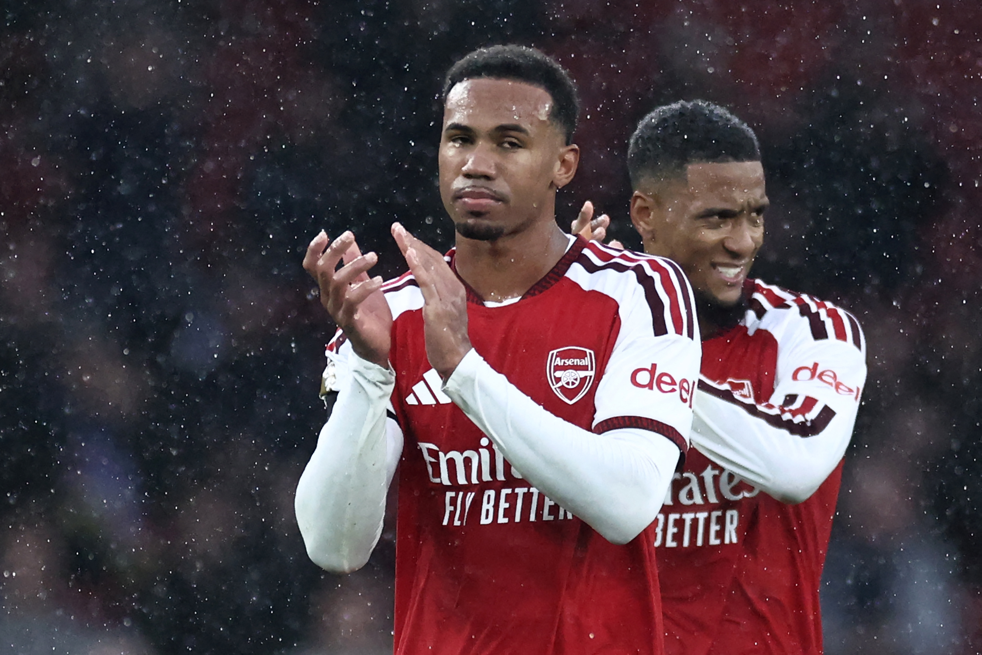 Arsenal's Brazilian defender #06 Gabriel Magalhaes (L) and Arsenal's English defender #15 Ezri Konsa (R) applaud fans after the English Premier League football match between Arsenal and Everton at the Emirates Stadium in London on October 24, 2026.