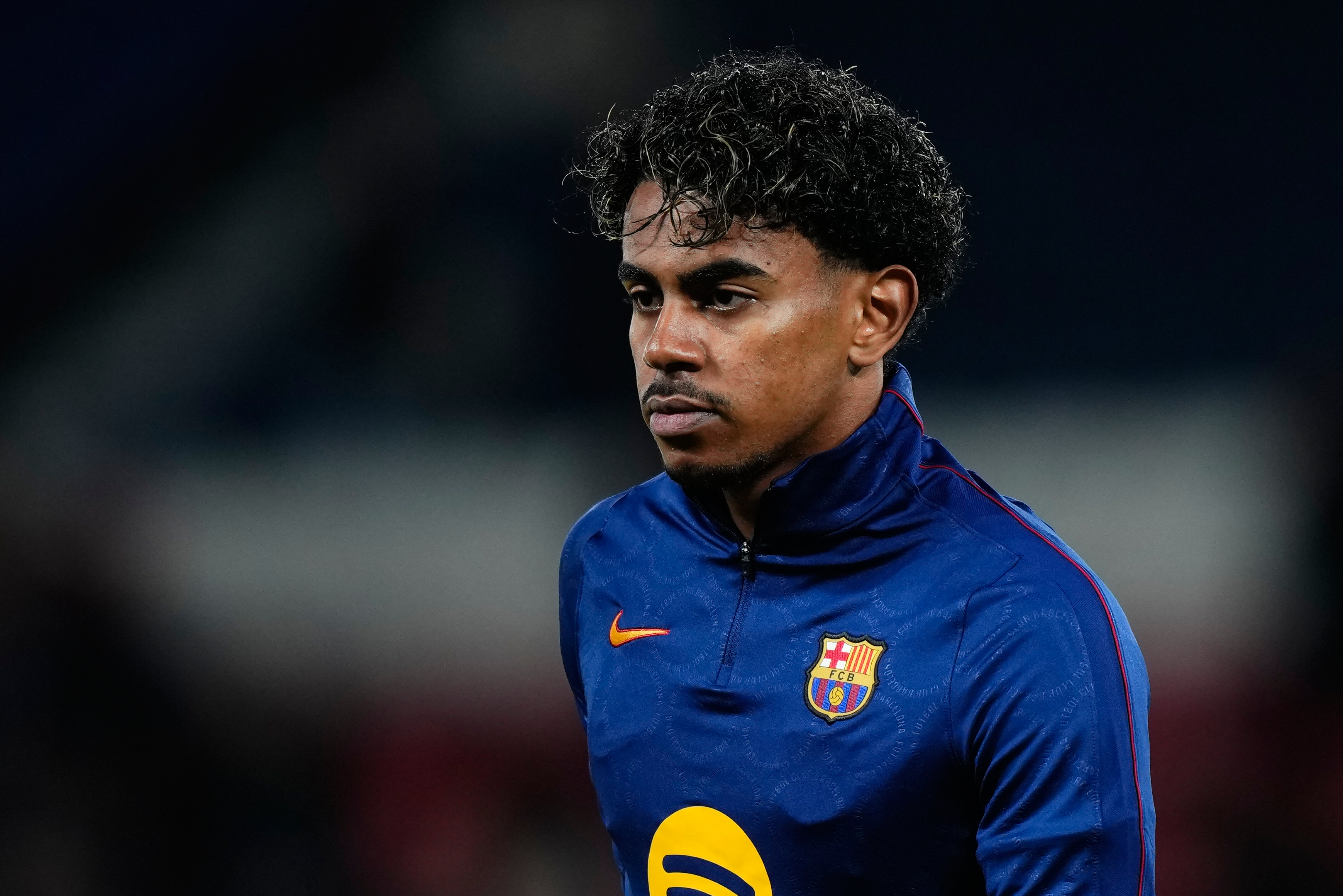 Barcelona's Lamine Yamal warms up before the Champions League opening phase soccer match between Paris Saint-Germain and FC Barcelona in Paris, Tuesday, Oct. 20, 2026. (AP Photo/Teresa Suarez)