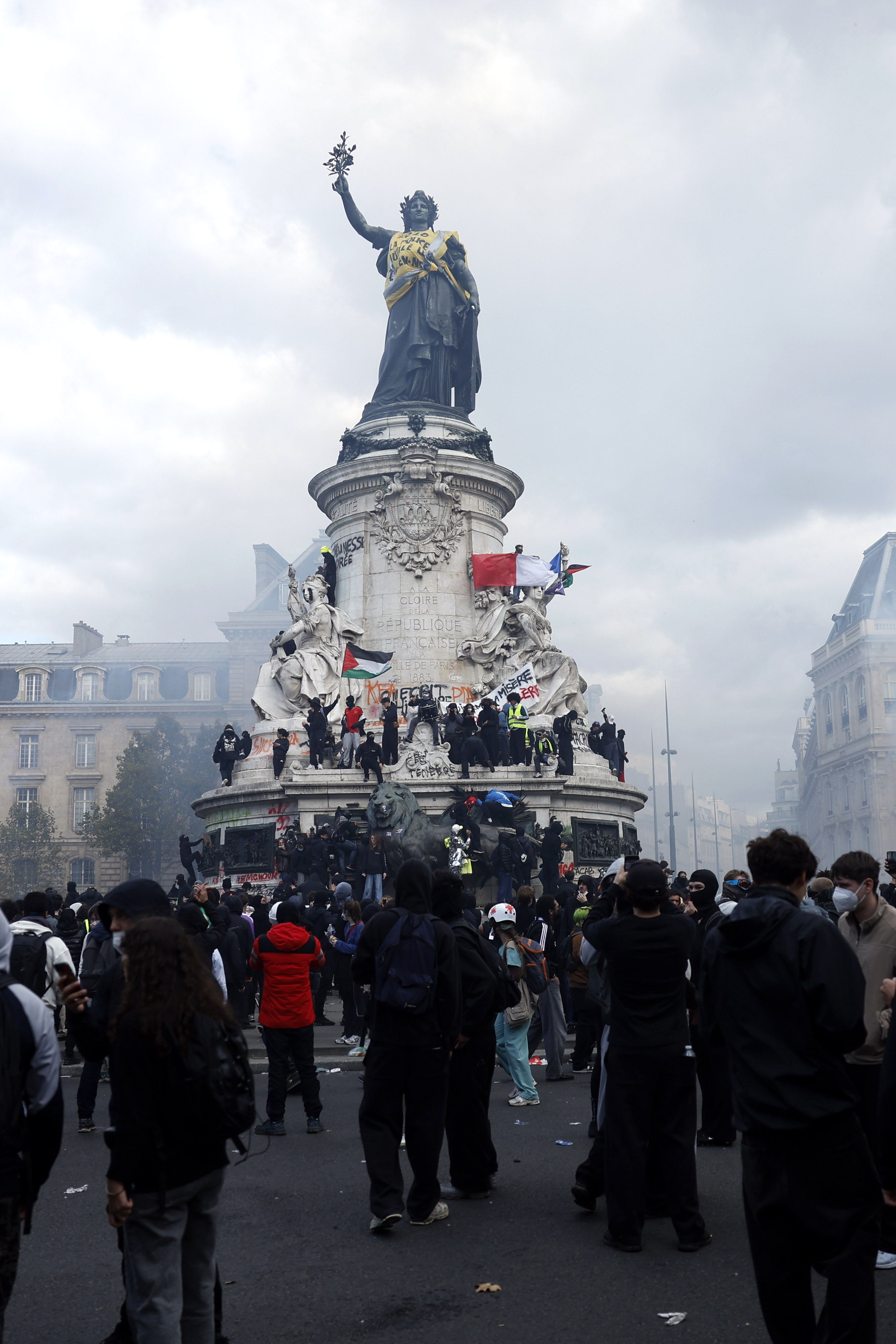 epa13311645 Protesters participate in a demonstration against rising living costs and cuts to public services at Place de la Republique in Paris, France, 17 October 2026. The nationwide mobilization brings together Yellow Vest (Gilets Jaunes) activists, high school and university students, trade unions and other groups protesting rising living costs, fuel prices and deteriorating public services, while demanding improvements in education and school conditions. EPA/YOAN VALAT