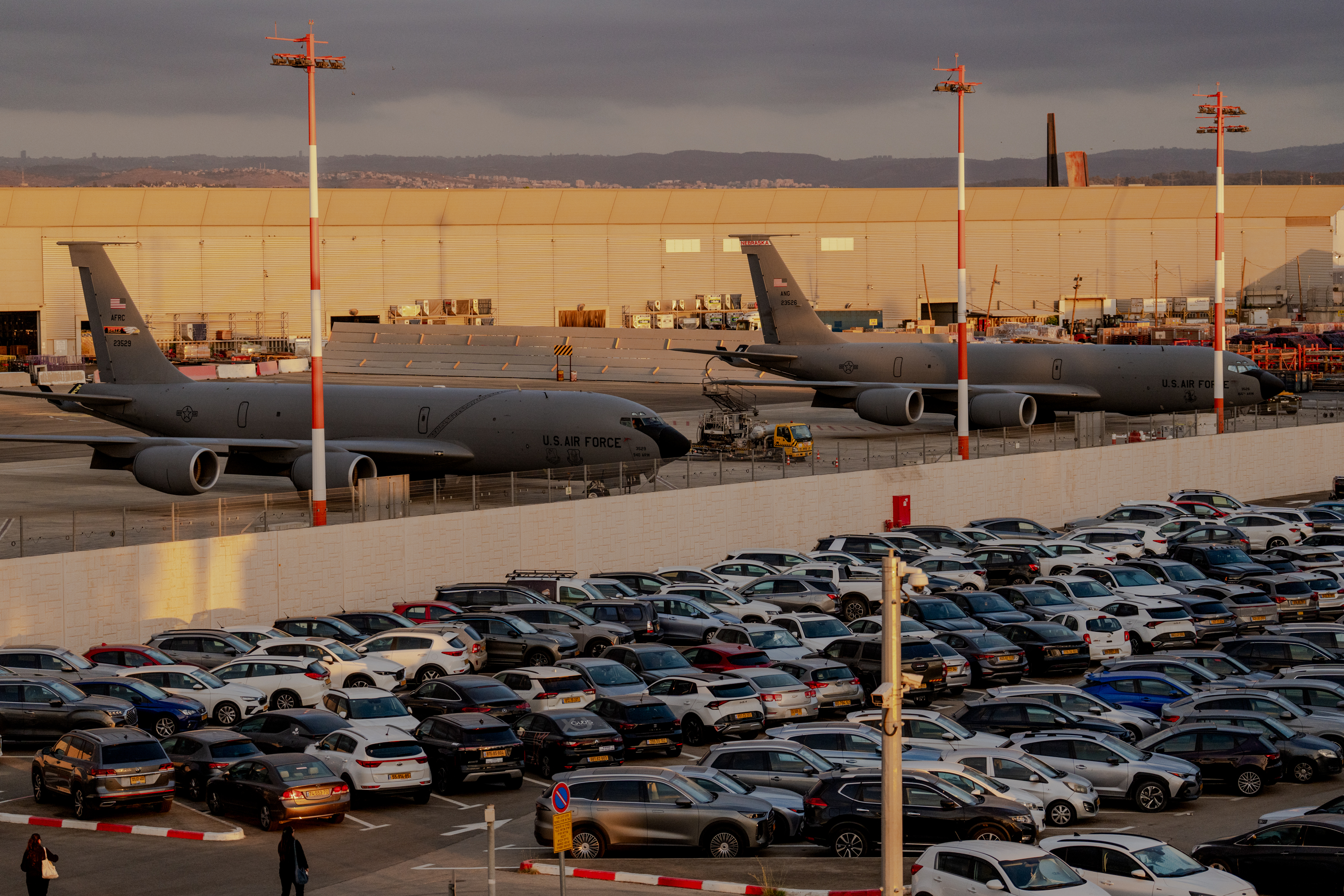 TZAFRIA, ISRAEL - SEPTEMBER 30: Two US Air Force KC-135 Stratotanker aerial refueling planes sit parked on the tarmac behind a crowded airport parking lot at Ben Gurion Airport on September 30, 2026 in Tzafria, Israel. Earlier in the day, a Flydubai flight en route from Dubai to Tel Aviv was diverted to Saudi Arabia following a violent cockpit struggle where passengers reported a pilot was stabbed. A second retrieval aircraft was deployed to collect the stranded passengers and fly them home to Israel. (Photo by Erik Marmor/Getty Images)