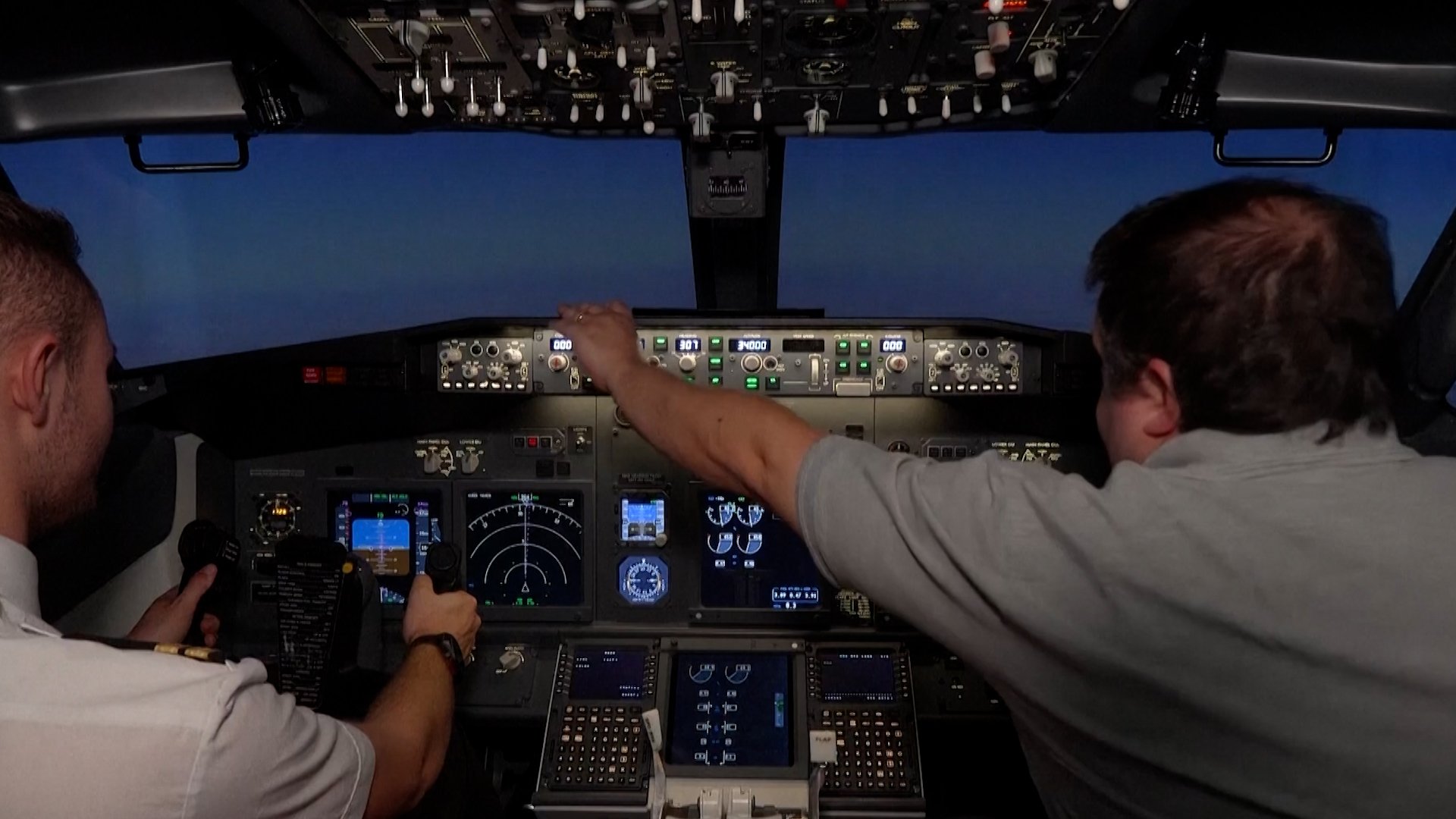 Flight instructor in a flight simulation