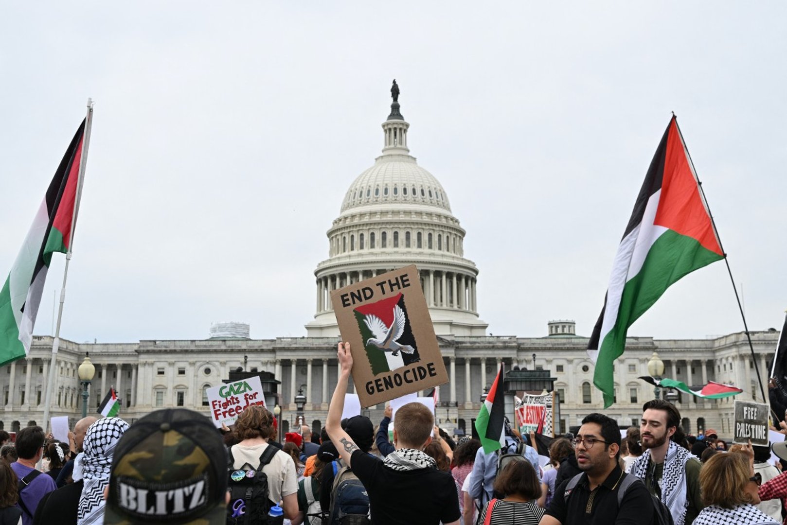 People participate in a march for Palestine near the US Capitol in Washington, DC on October 10, 2026. [ALEX WROBLEWSKI / AFP]