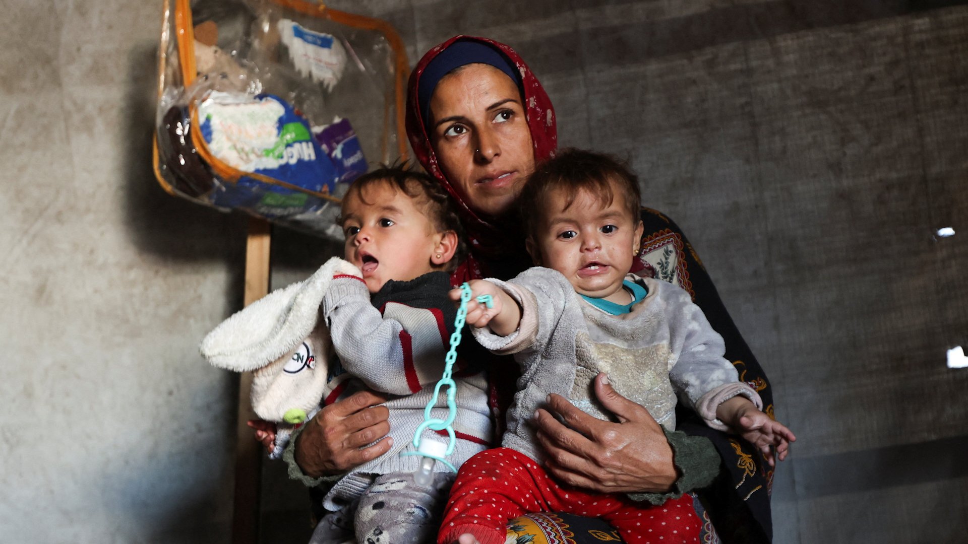 Palestinian mother and her children in Gaza